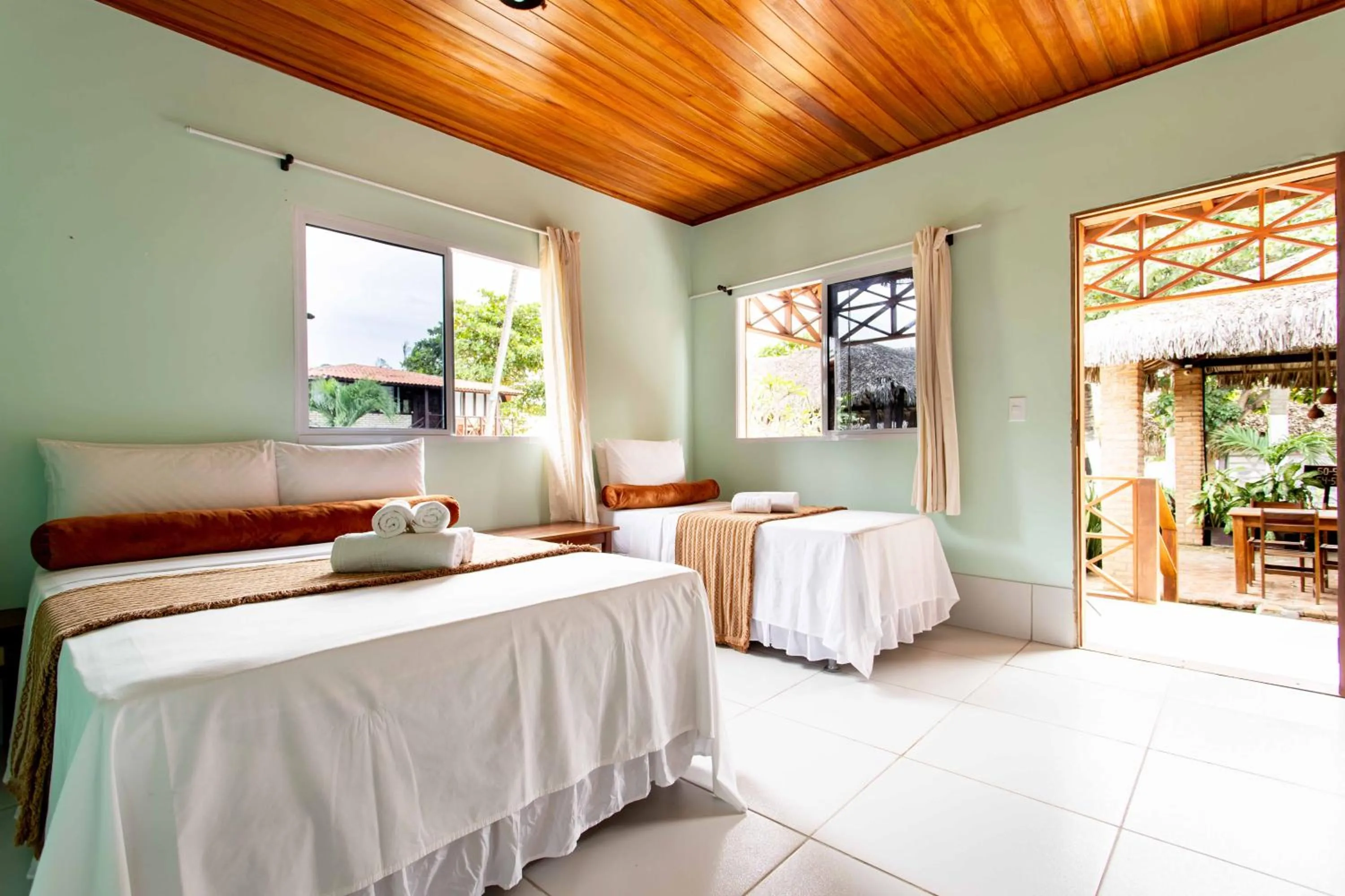 Bed in Pousada Capitão Thomaz