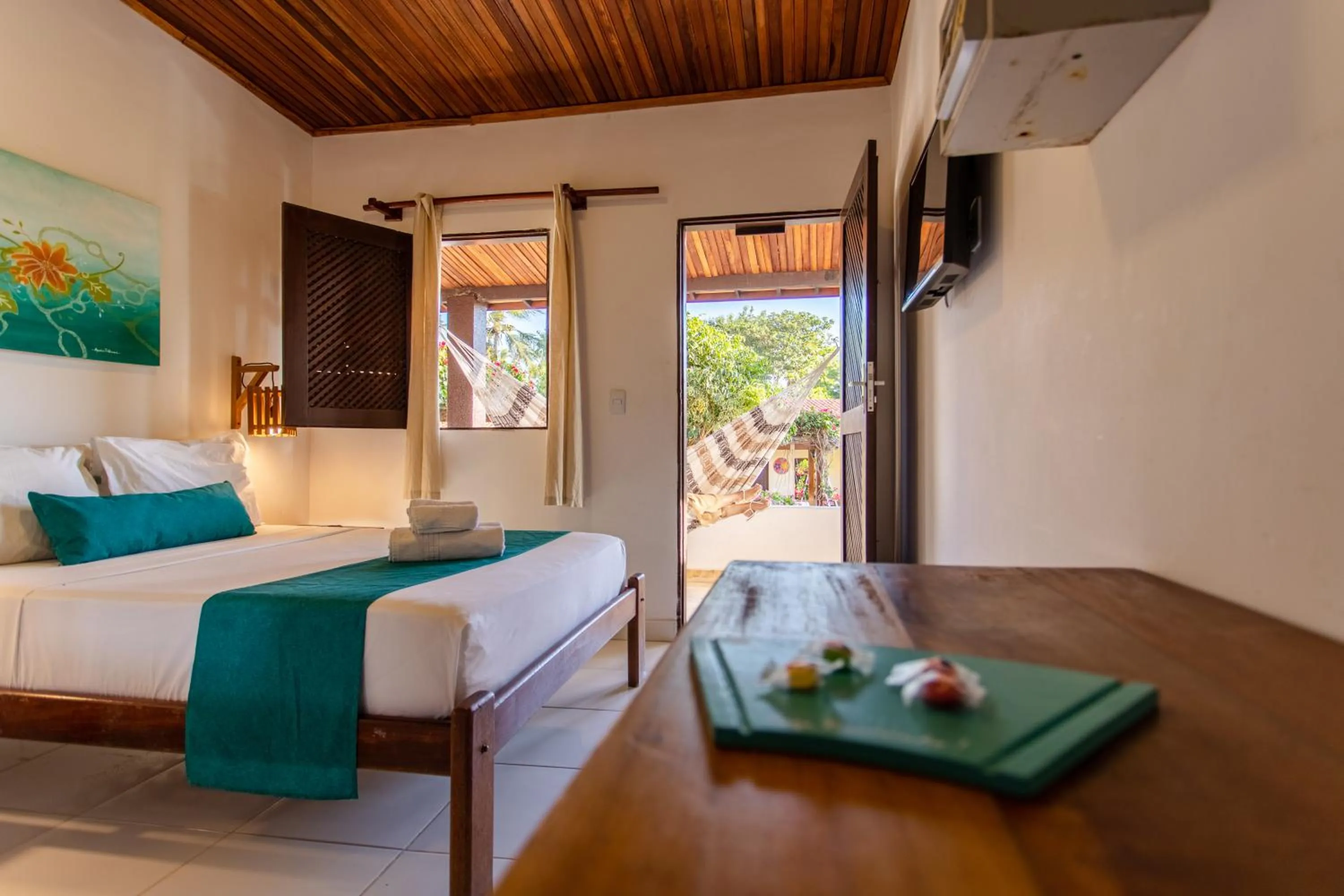 Bed in Pousada Capitão Thomaz