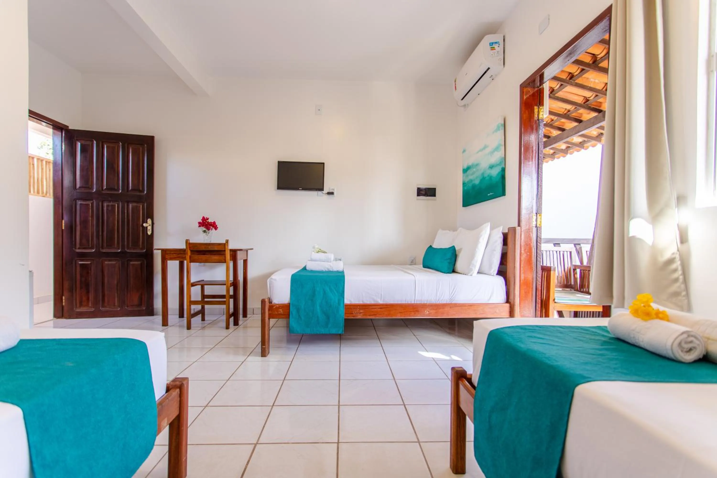 Bed in Pousada Capitão Thomaz