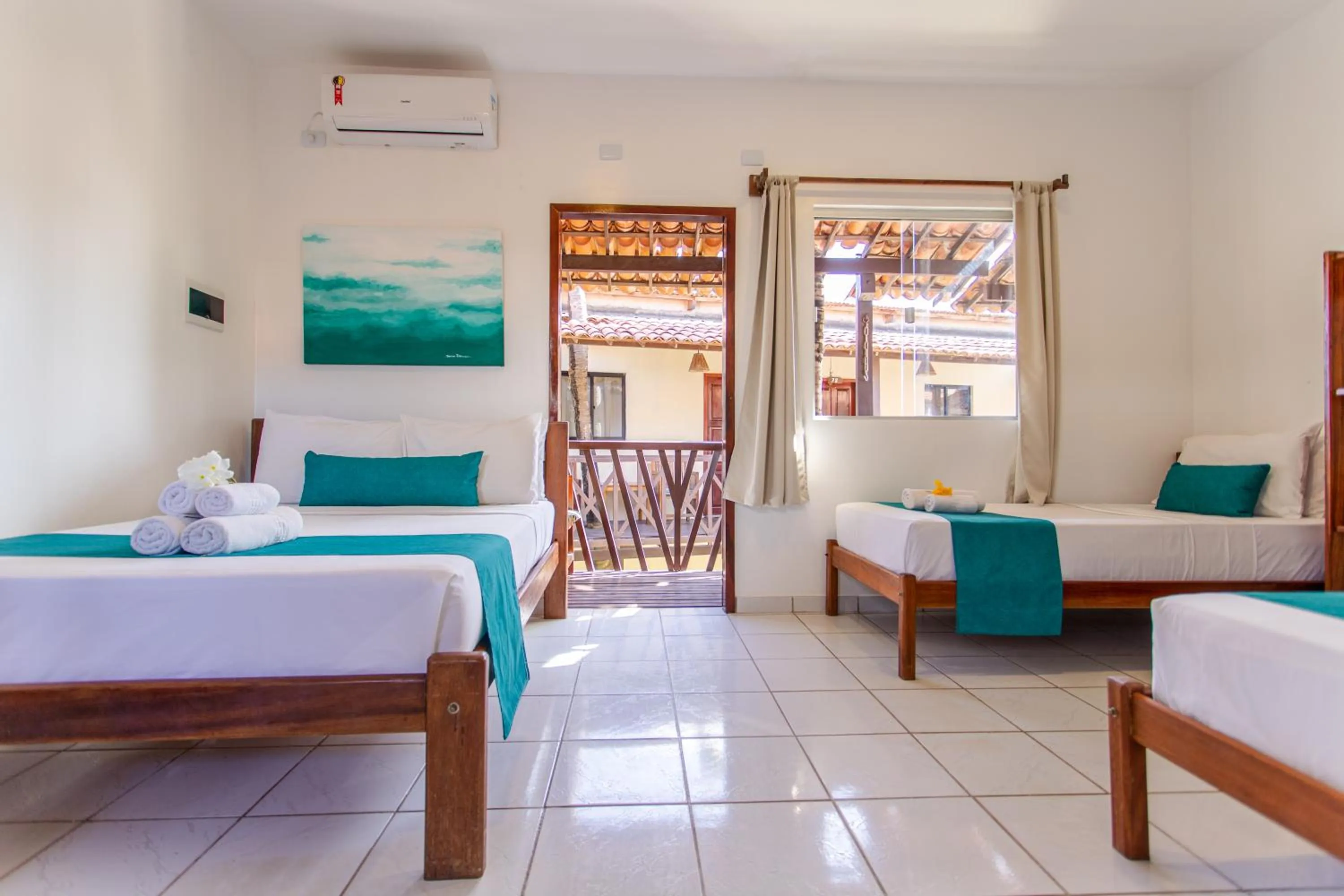 Bed in Pousada Capitão Thomaz