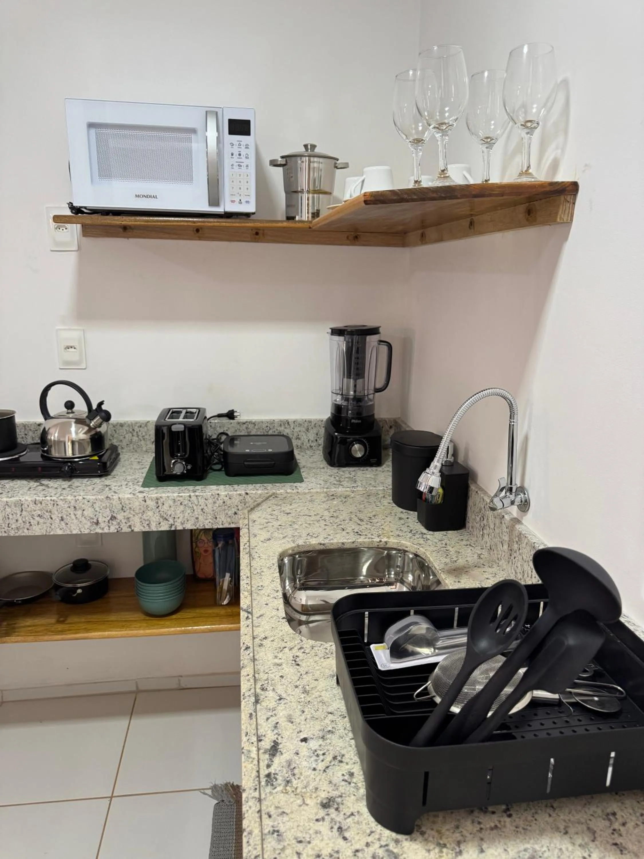 Kitchen or kitchenette in Pousada Capitão Thomaz