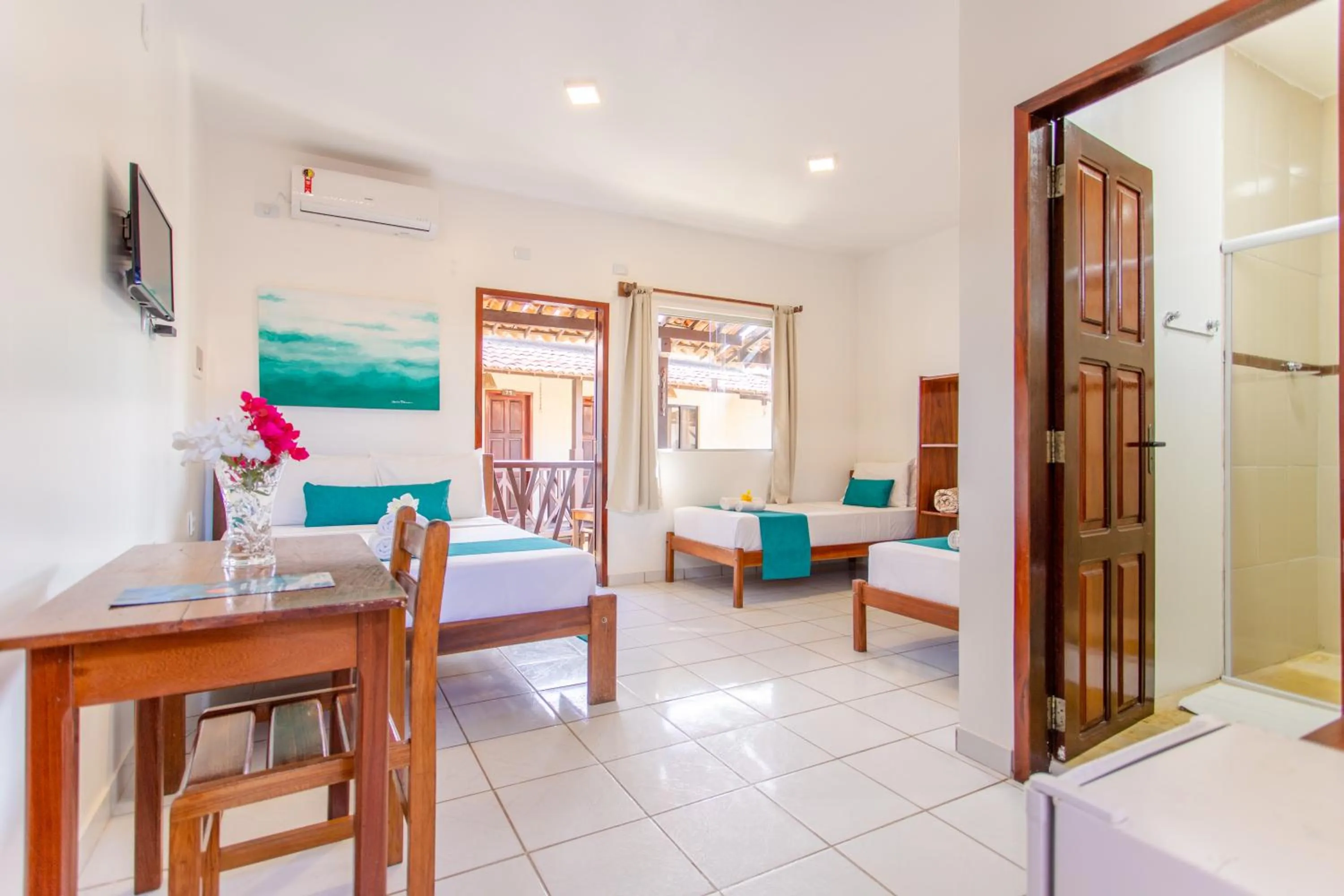 Bed in Pousada Capitão Thomaz