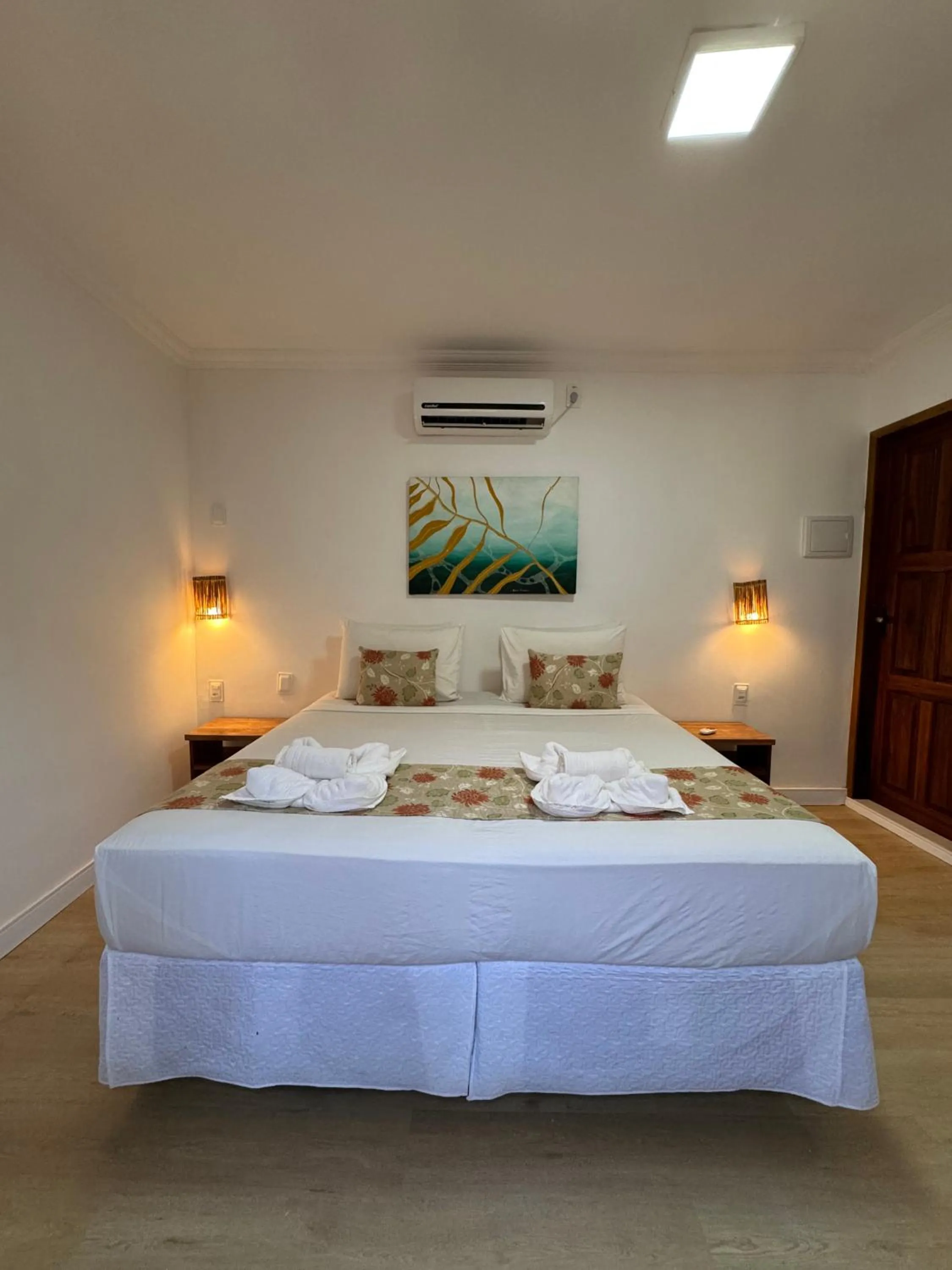 Bed in Pousada Capitão Thomaz