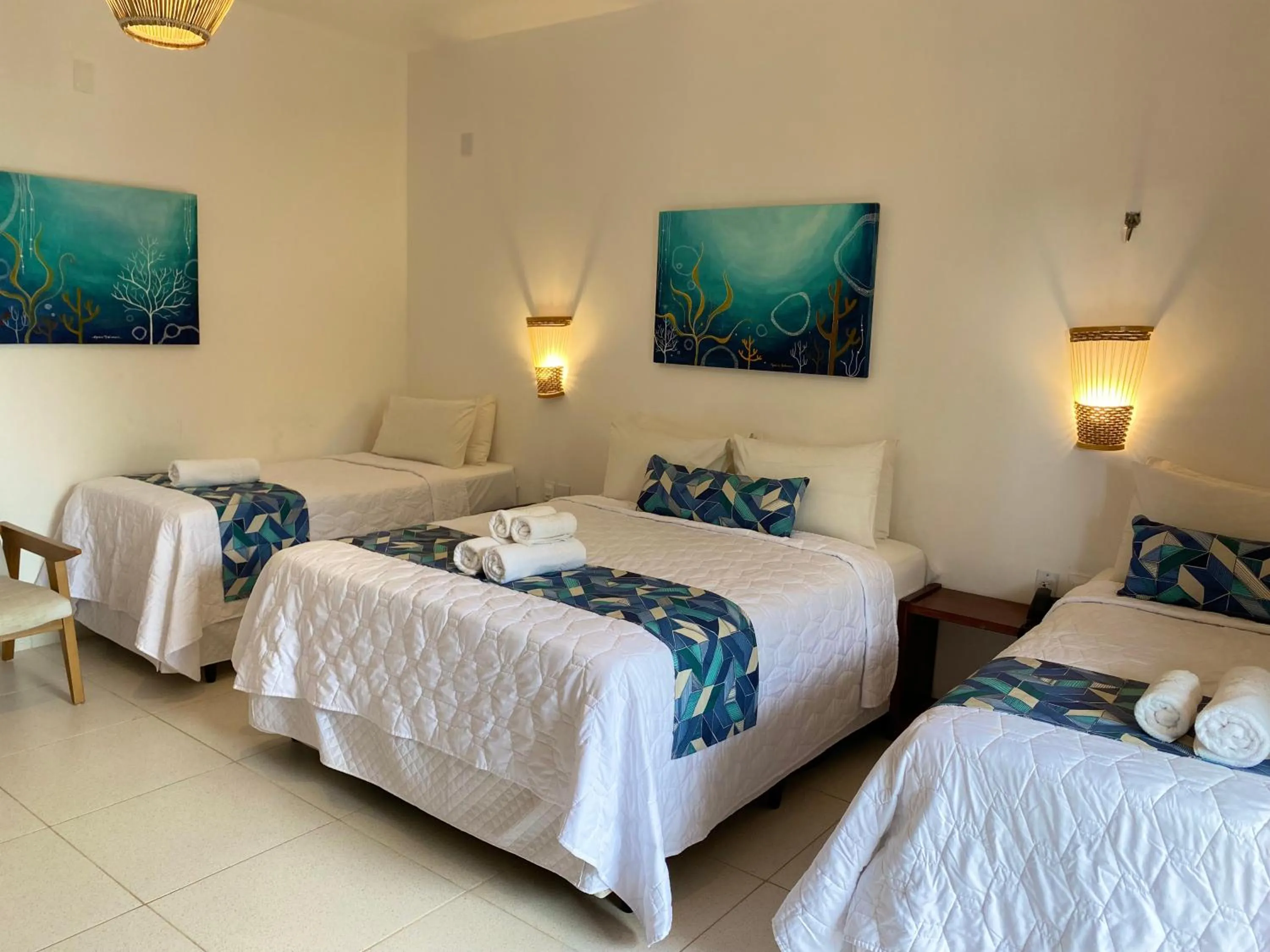 Bed in Pousada Capitão Thomaz