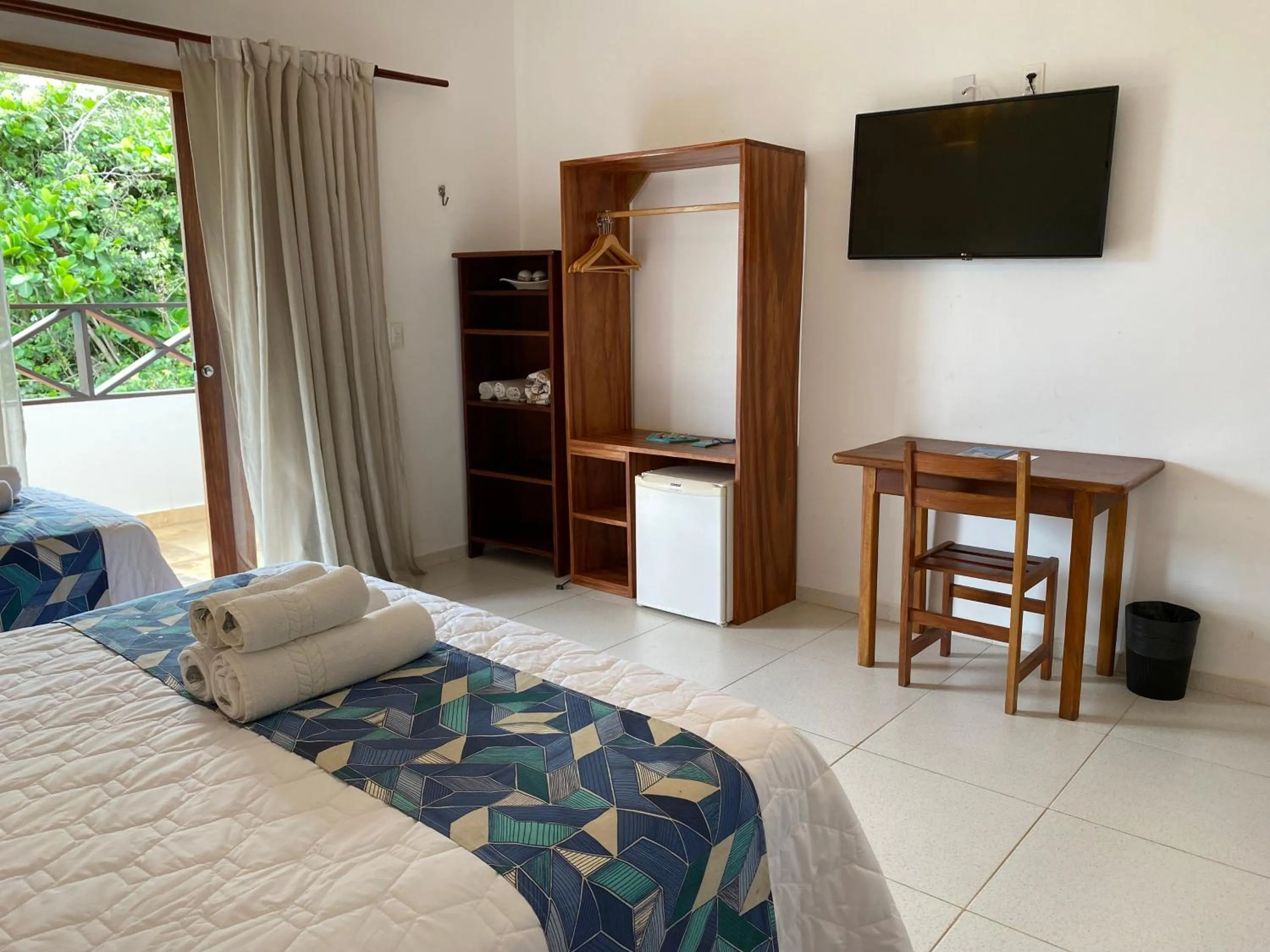 Bed in Pousada Capitão Thomaz