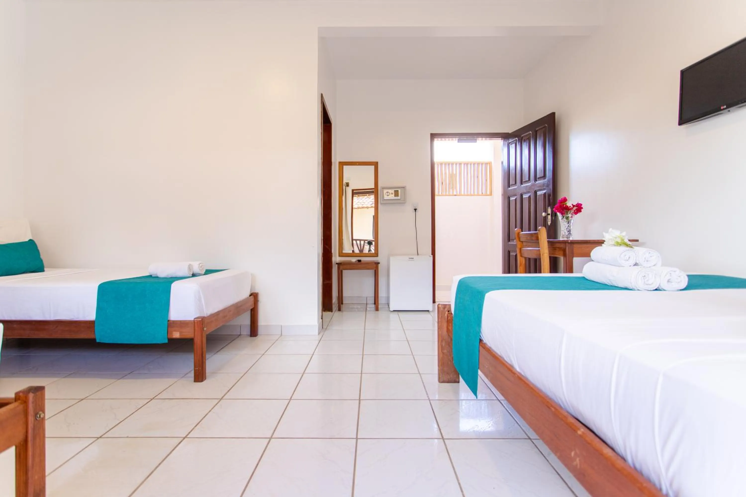 Bed in Pousada Capitão Thomaz