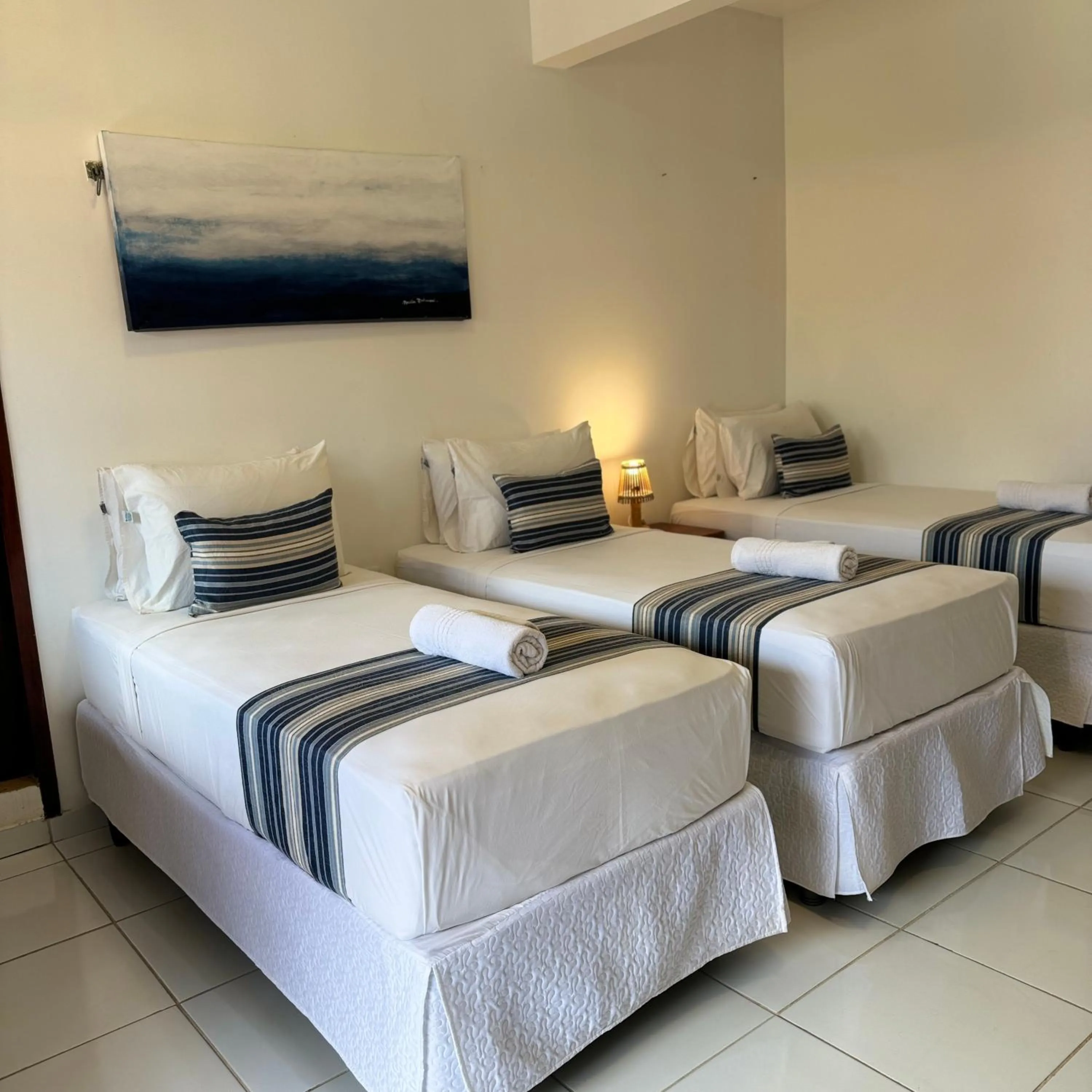 Bed in Pousada Capitão Thomaz