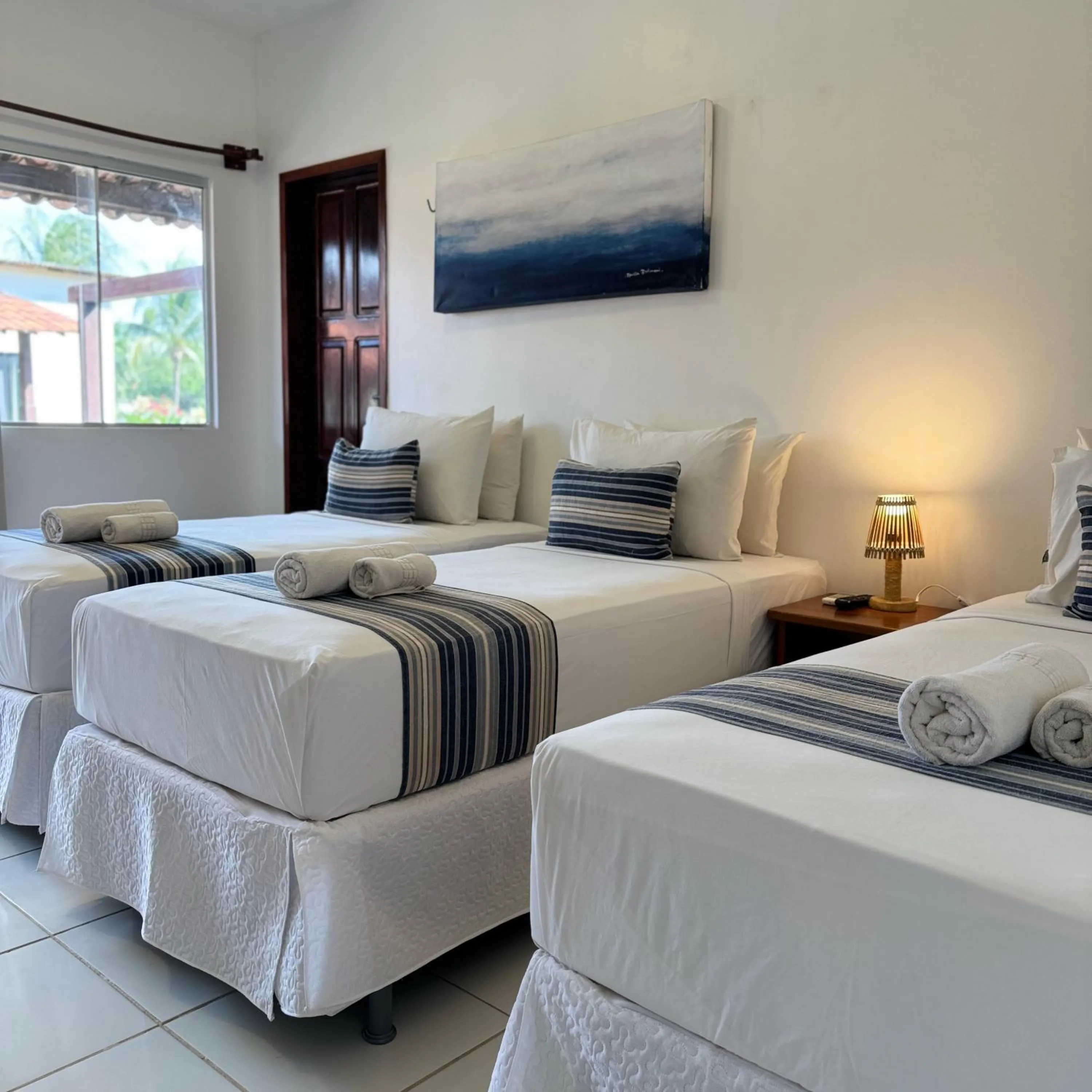 Bed in Pousada Capitão Thomaz