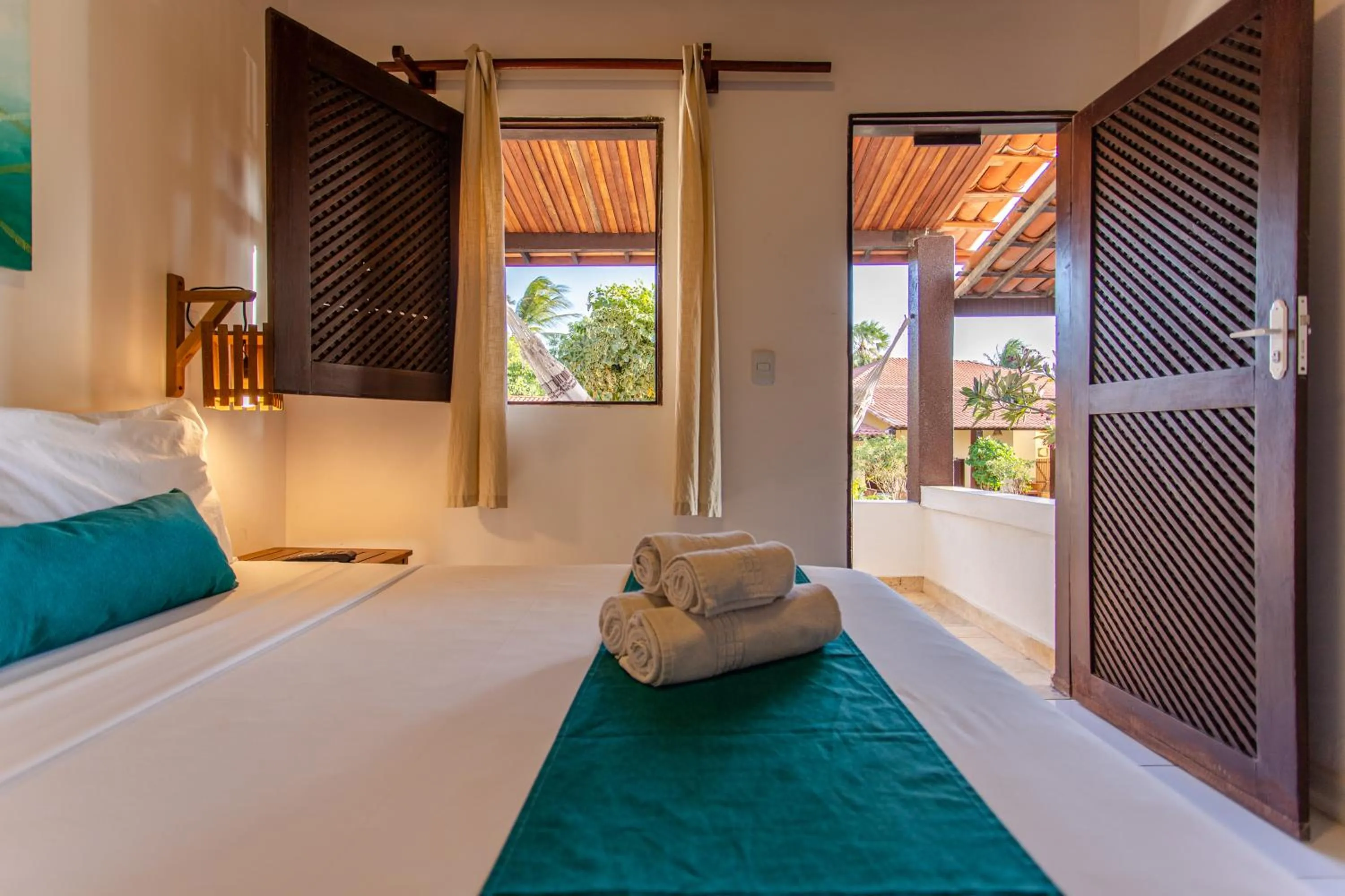 Bed in Pousada Capitão Thomaz