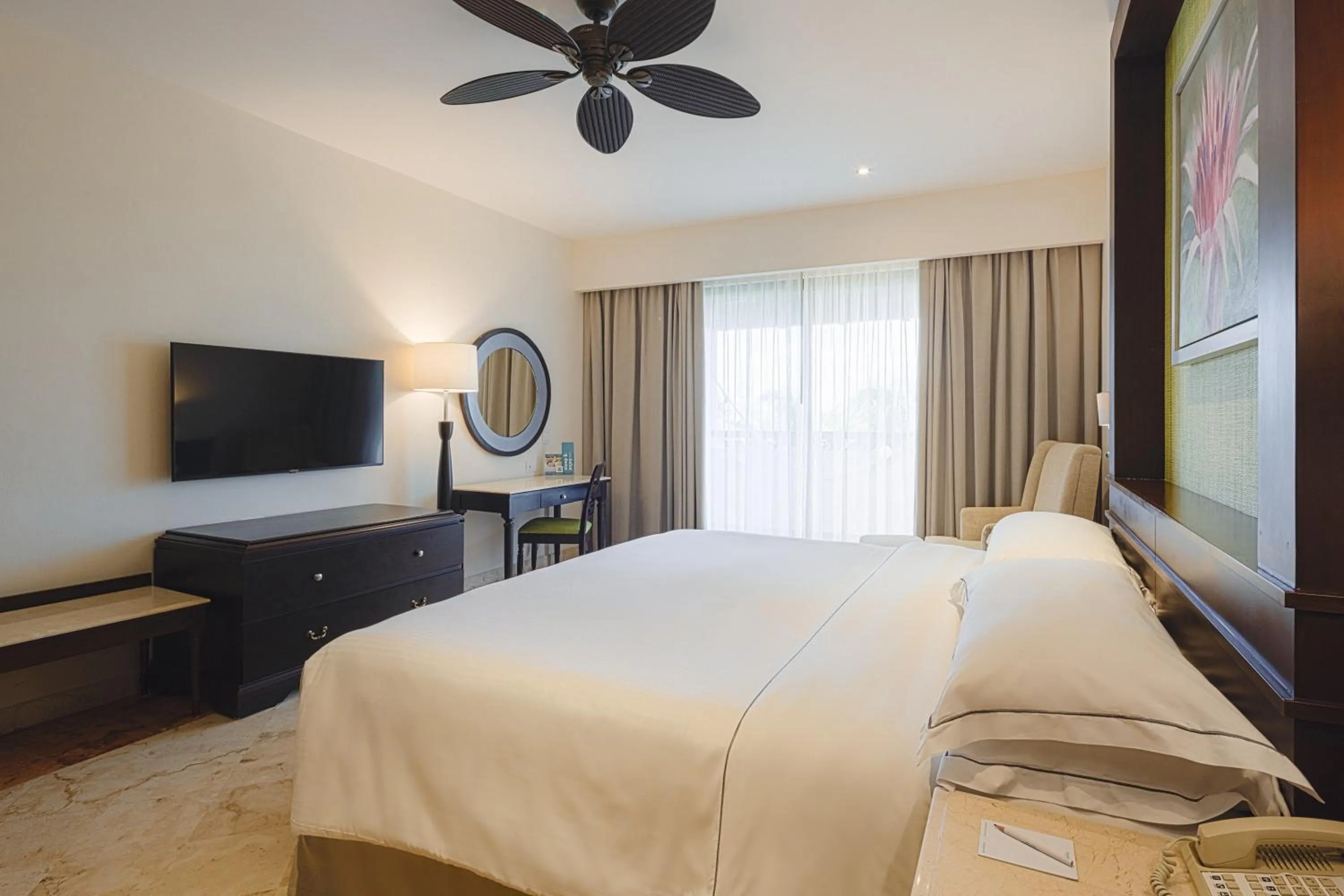 Photo of the whole room, Bed in Occidental at Xcaret Destination - All Inclusive