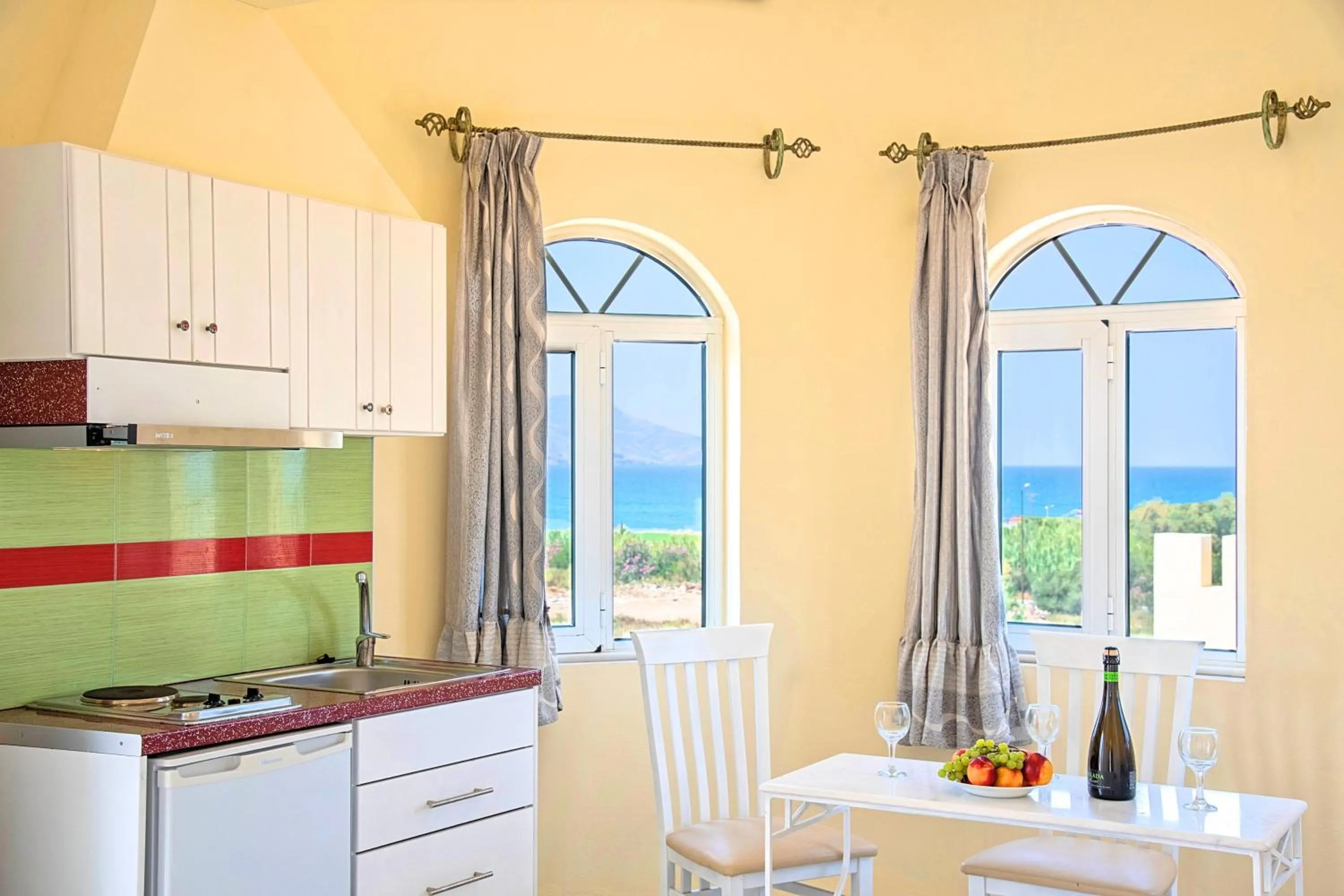 Kitchen or kitchenette in Palladion Hotel