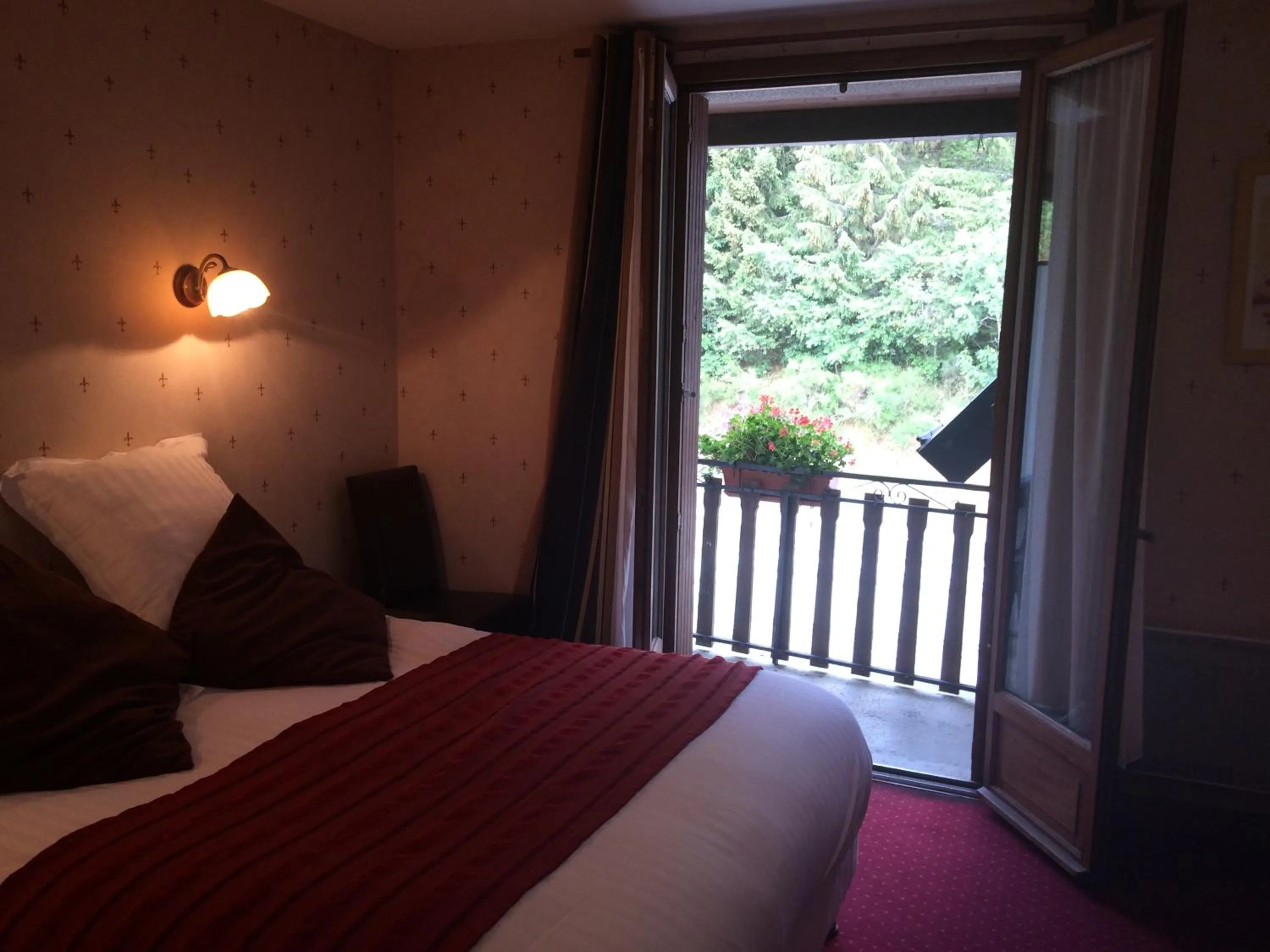 View (from property/room), Bed in Auberge de la Petite Ferme, Super-Besse Est, The Originals Relais