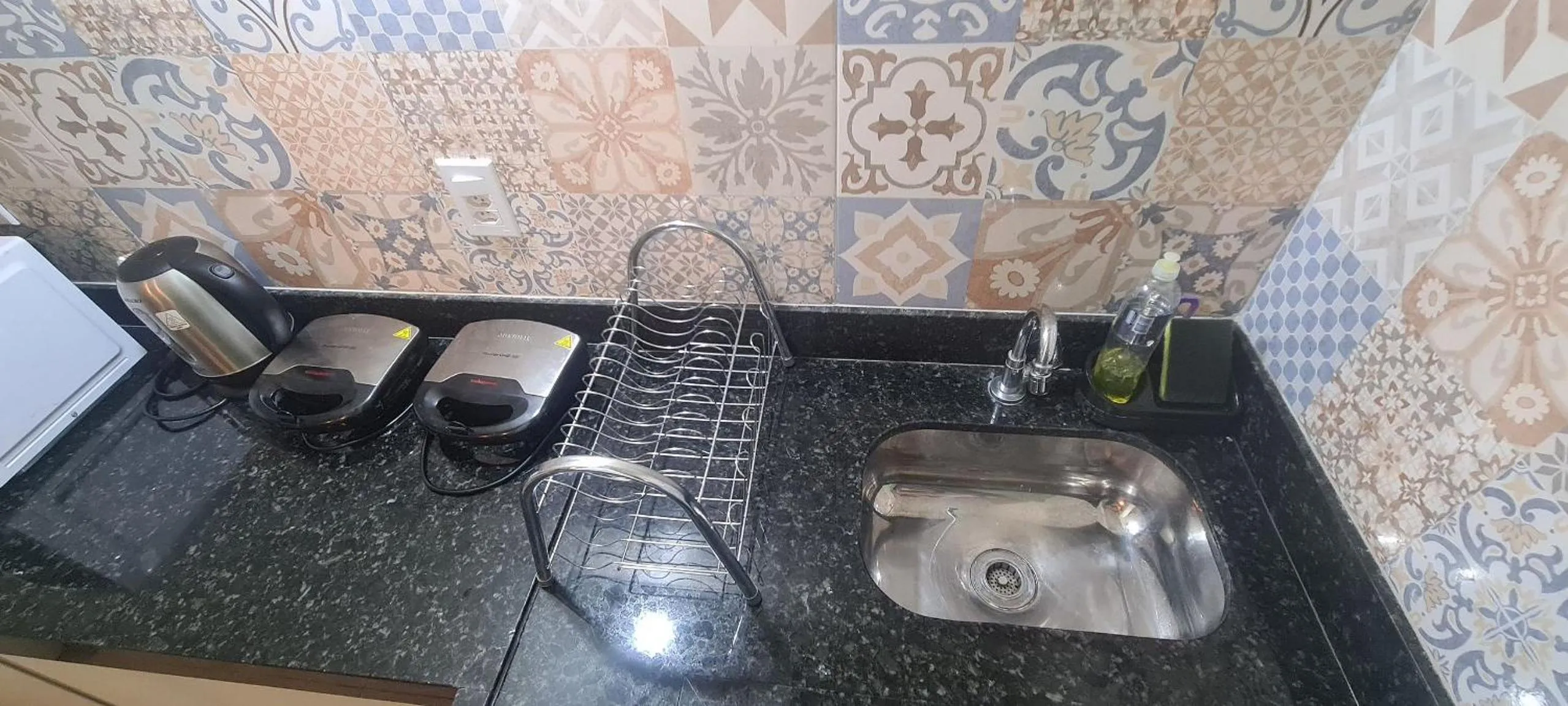 Communal kitchen in Recanto Del Mare Suítes