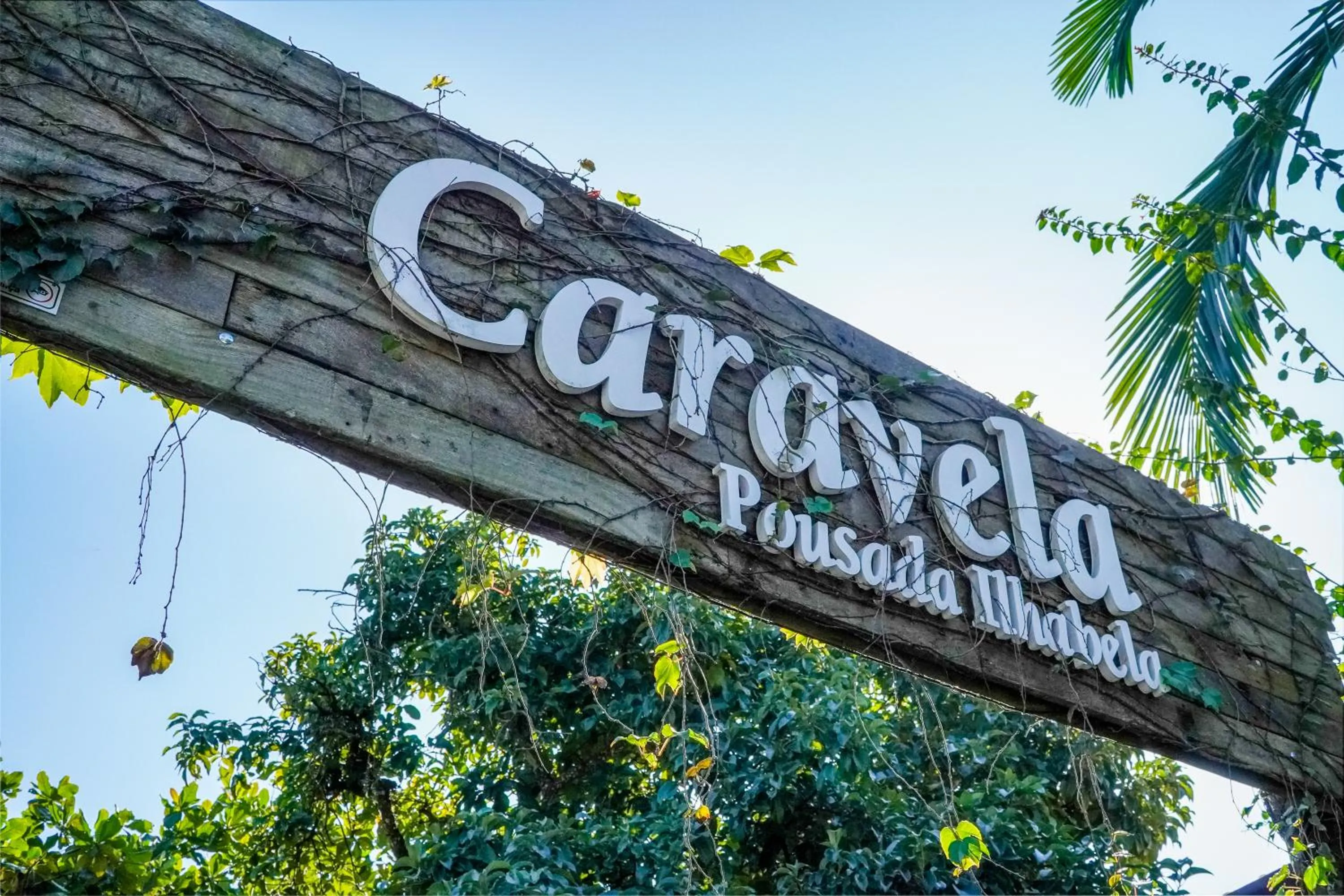 Property logo or sign in VELINN Caravela Pousada Ilhabela