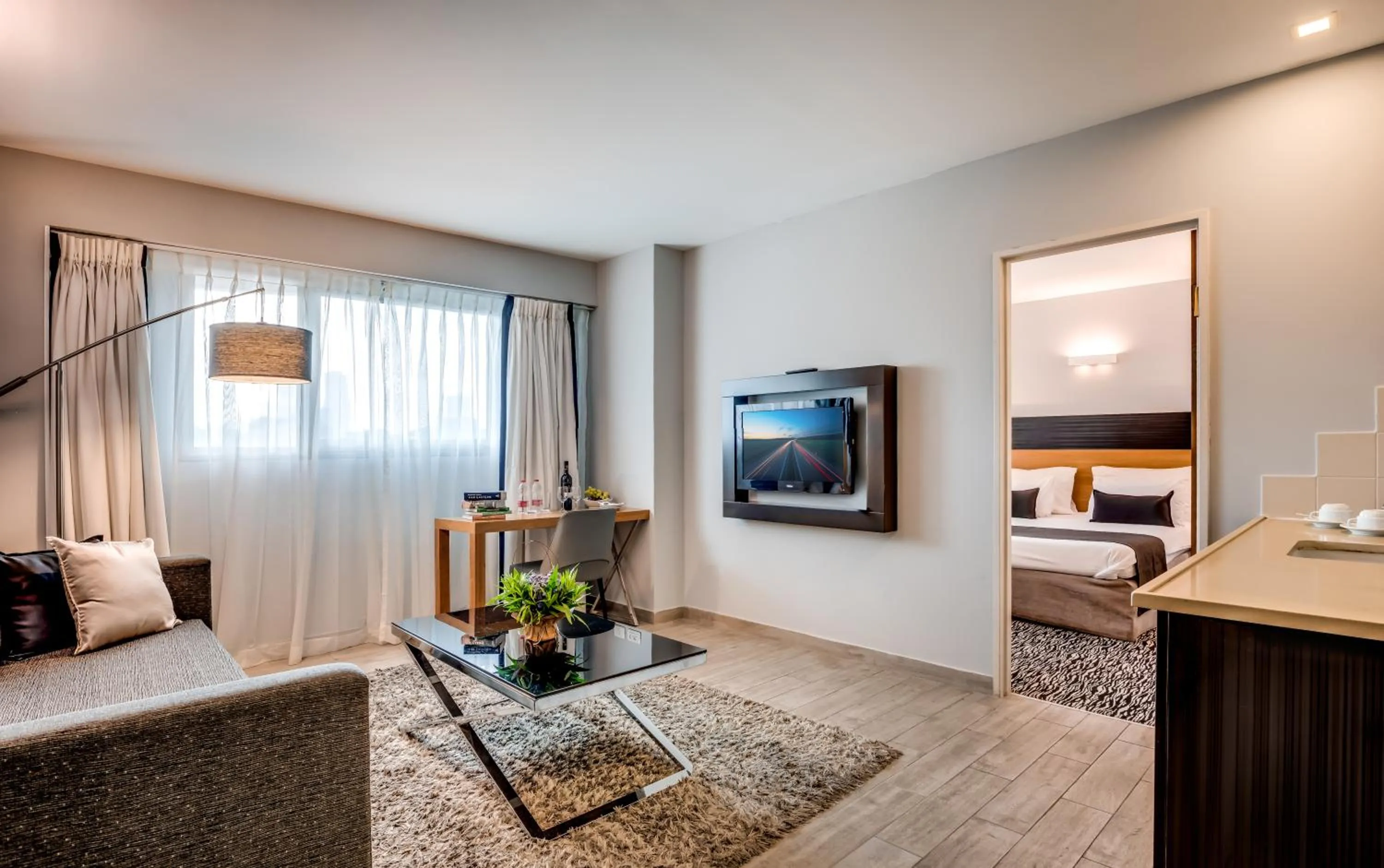 Living room, Bed in Ramada by Wyndham Ramat Gan