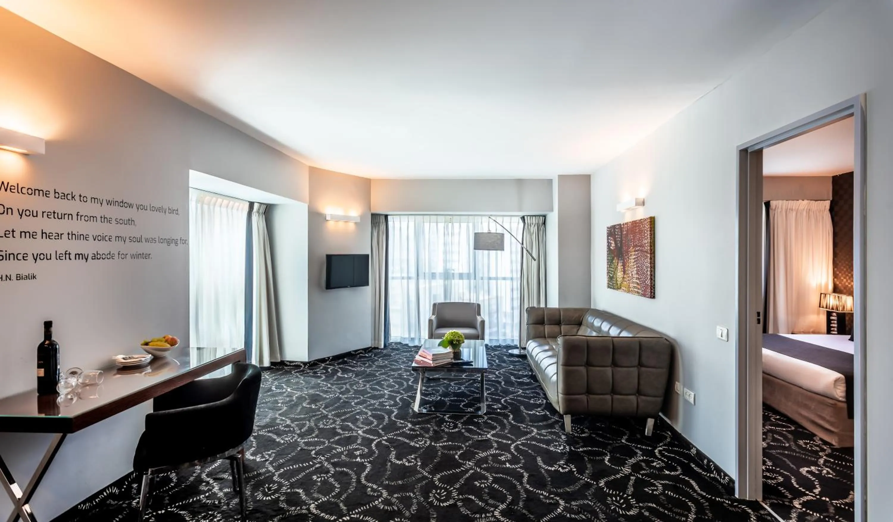 Living room, Bed in Ramada by Wyndham Ramat Gan