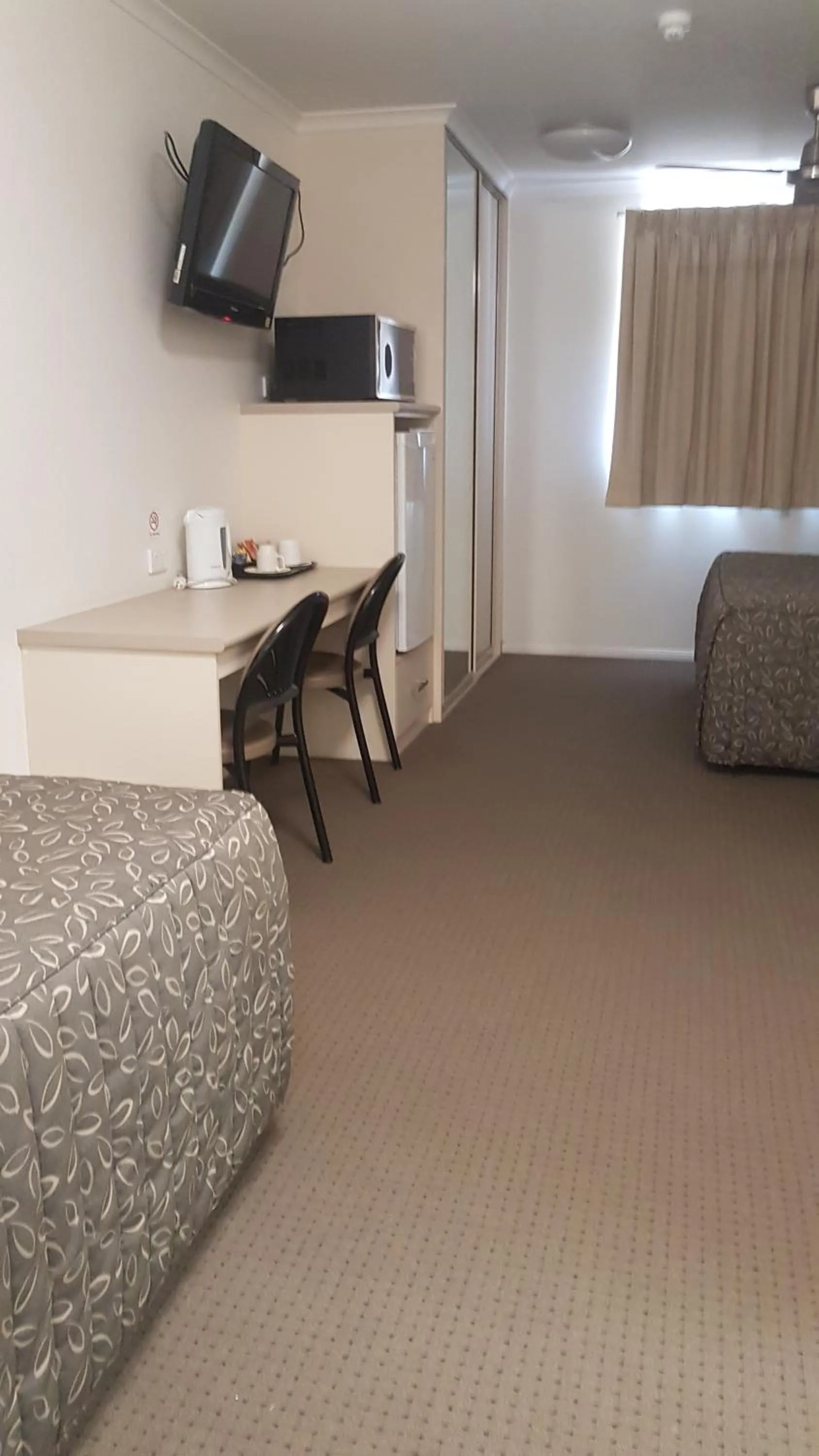 TV/Entertainment Center in Sarina Hotel