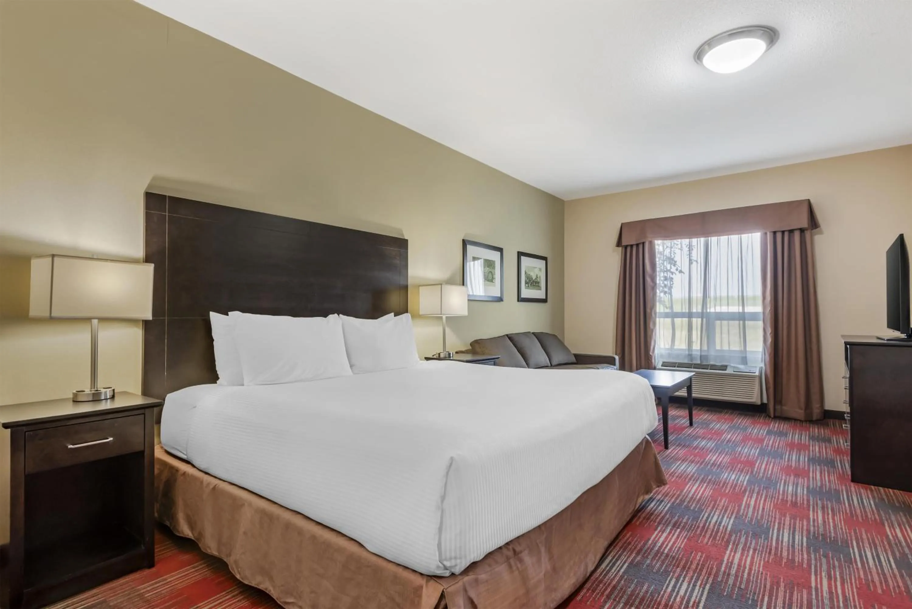 Bedroom, Bed in Best Western Plus Red Deer Inn & Suite