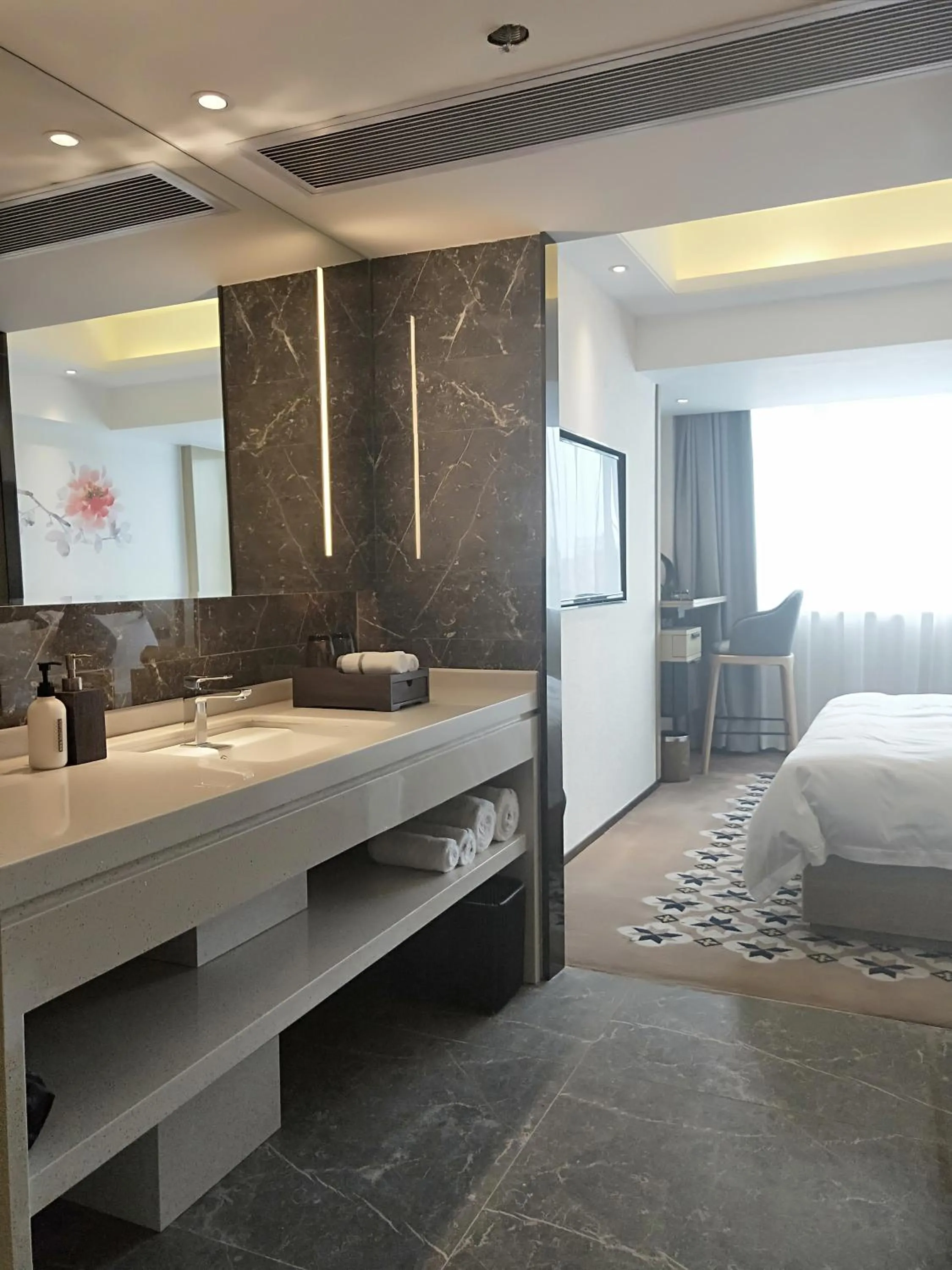 Decorative detail, Bed in Paco Hotel Guangzhou Jiangtai Road Metro Branch