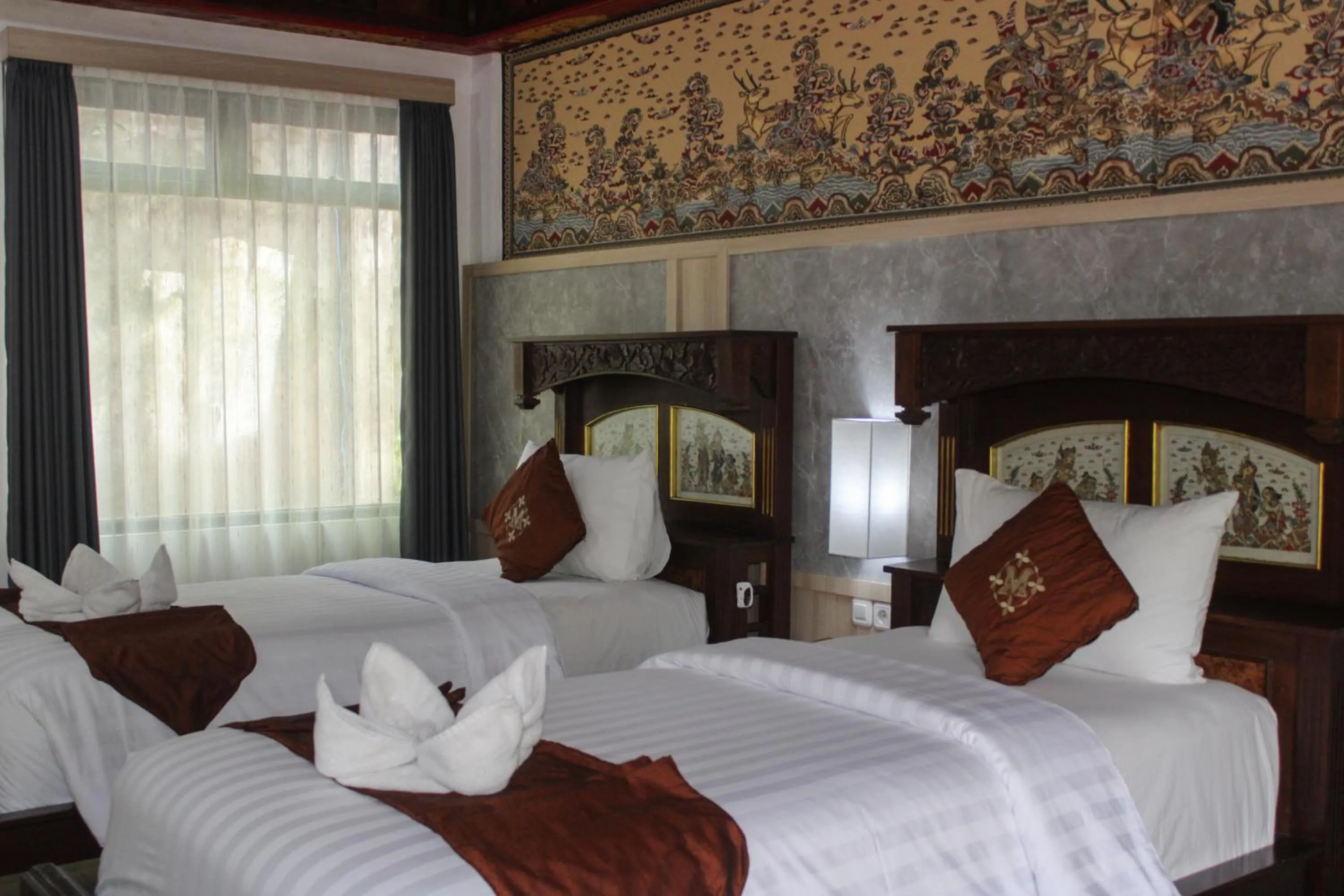 Bed in Melasti Kuta Beach Hotel & Spa