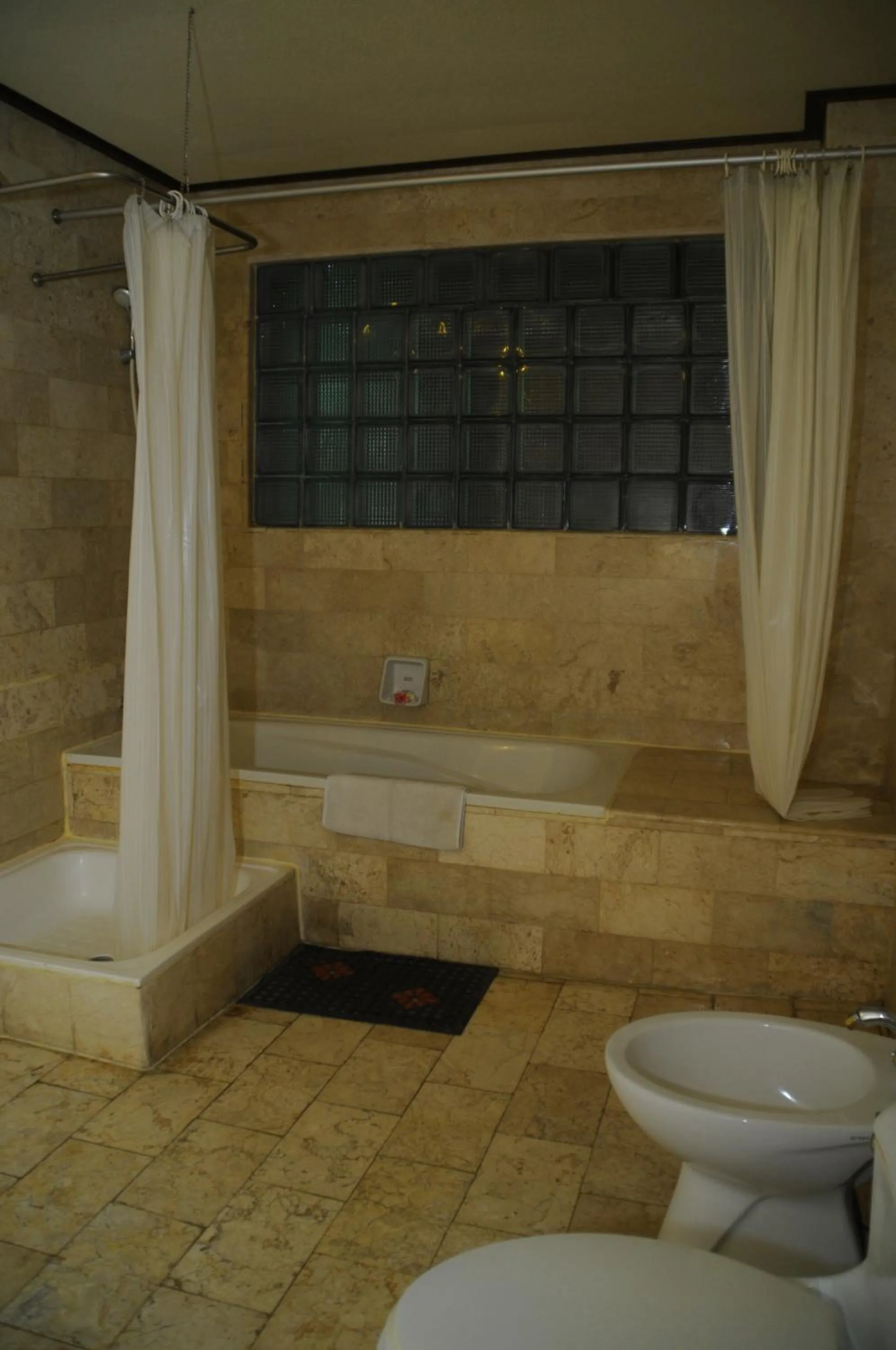 Shower in Melasti Beach Resort & Spa Legian