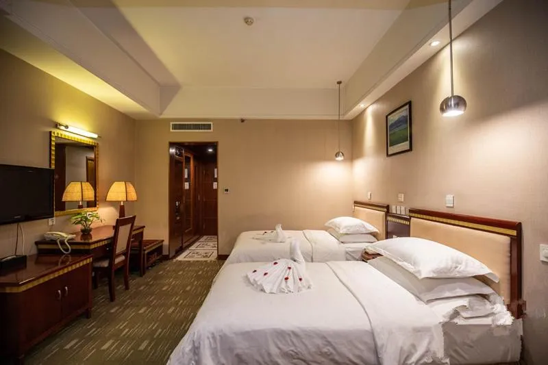 Bed in Kunming Golden Spring Hotel