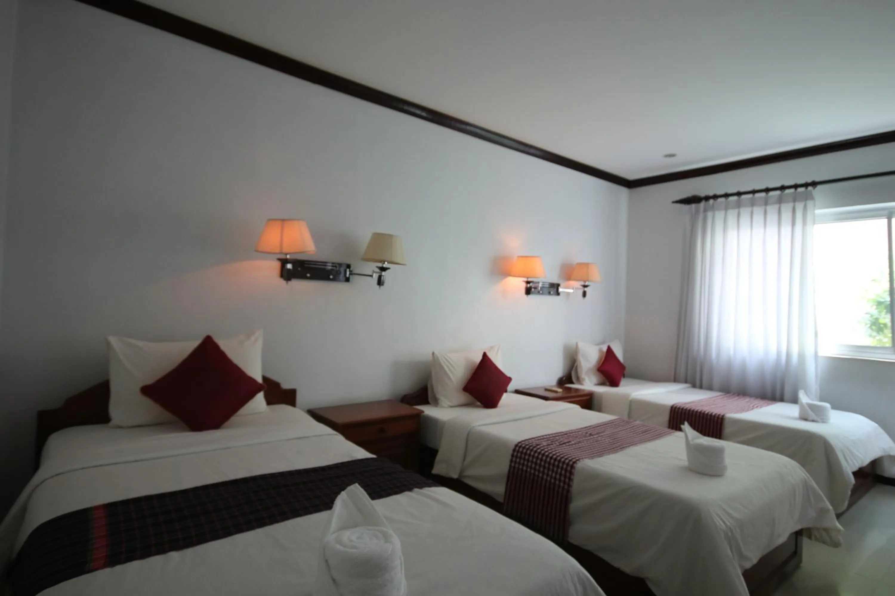 Property building, Bed in Mom's Guesthouse