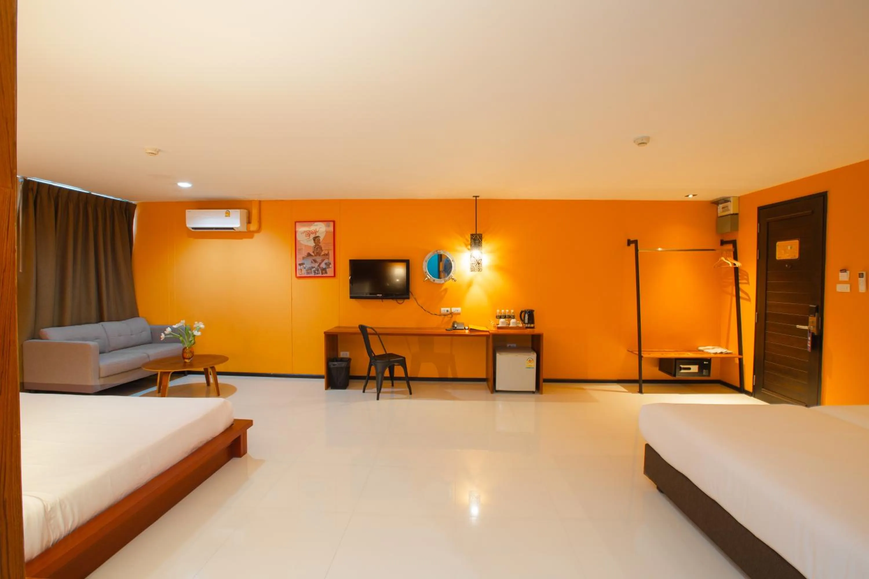 Seating area, Bed in MeStyle Place Hotel