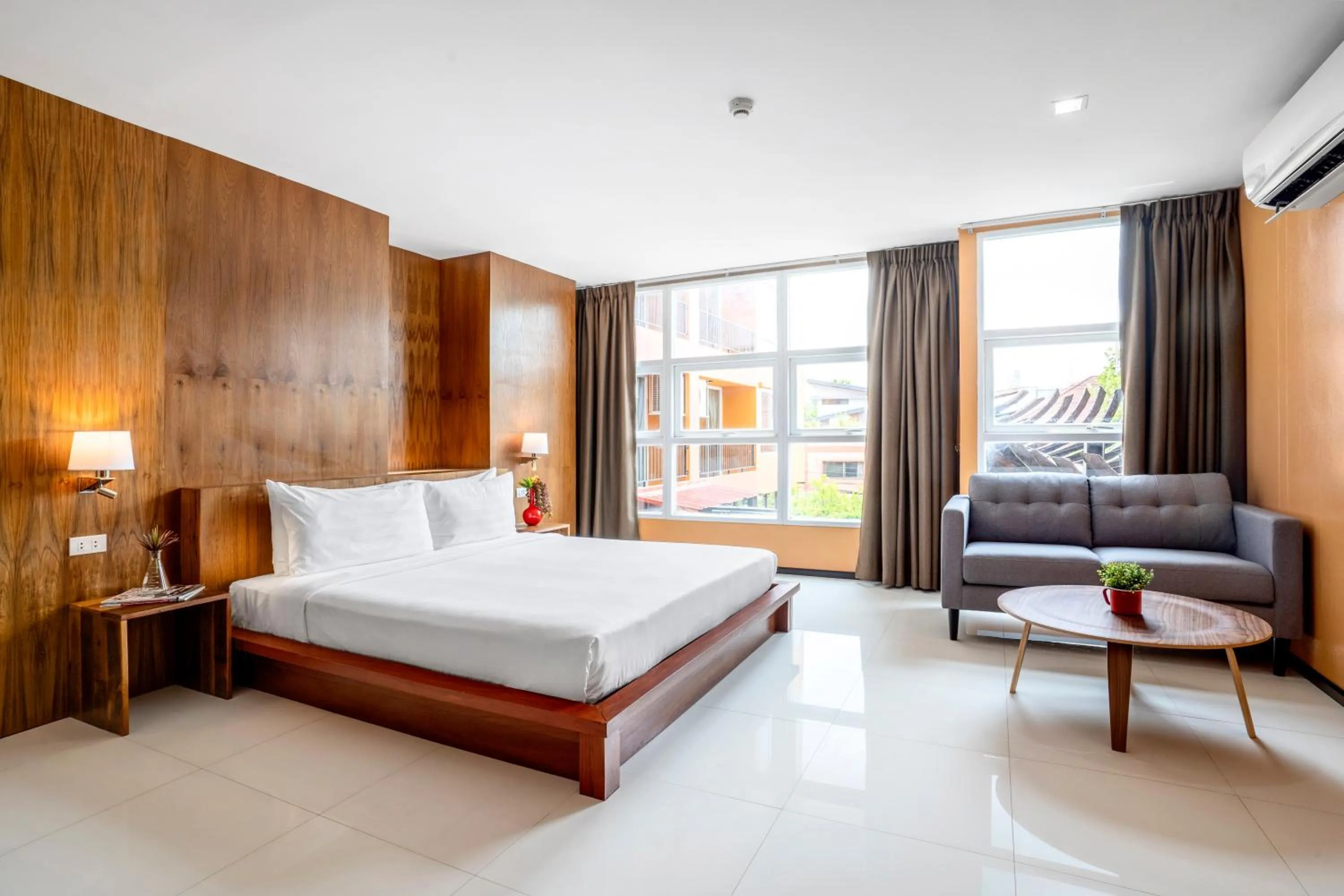 Seating area, Bed in MeStyle Place Hotel