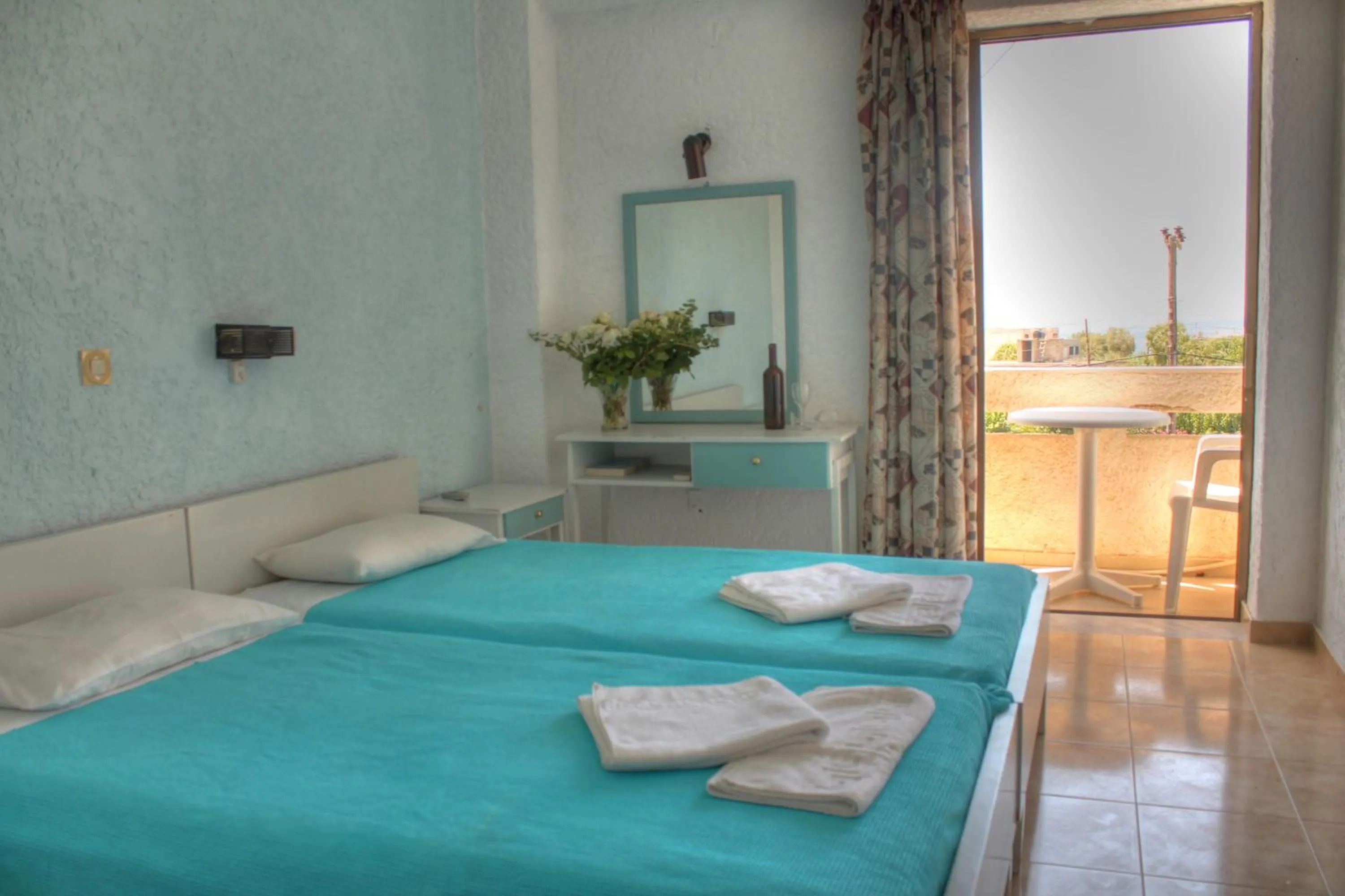 Bed in Esperides Hotel