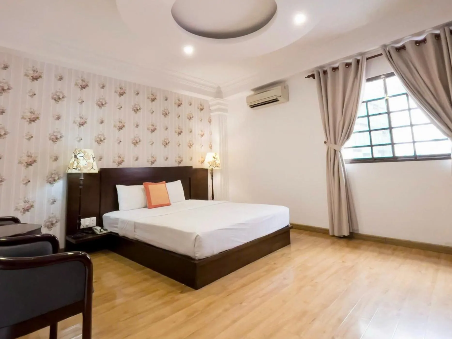 Bed in Little Brick Saigon Hotel