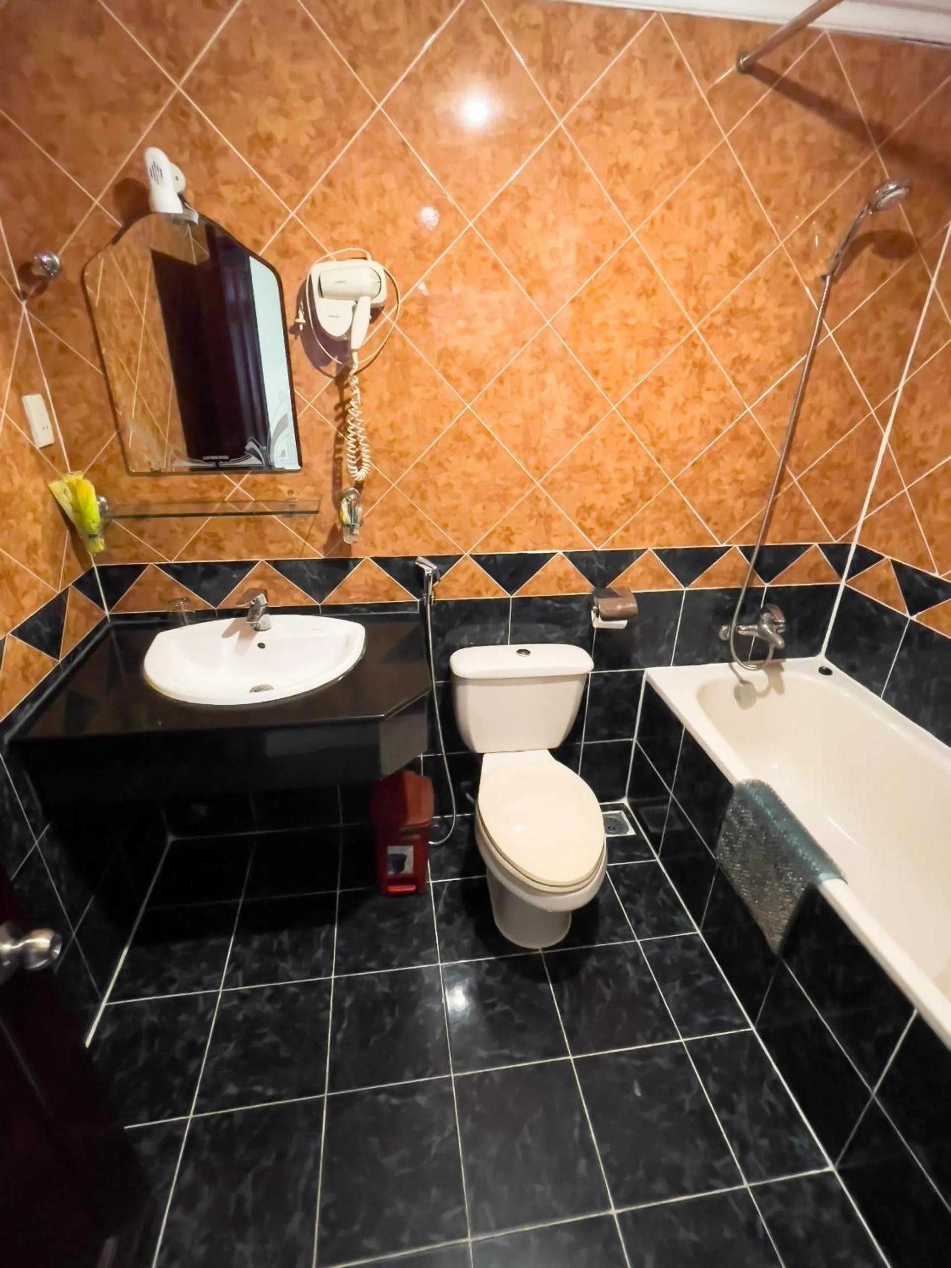 Shower in Little Brick Saigon Hotel