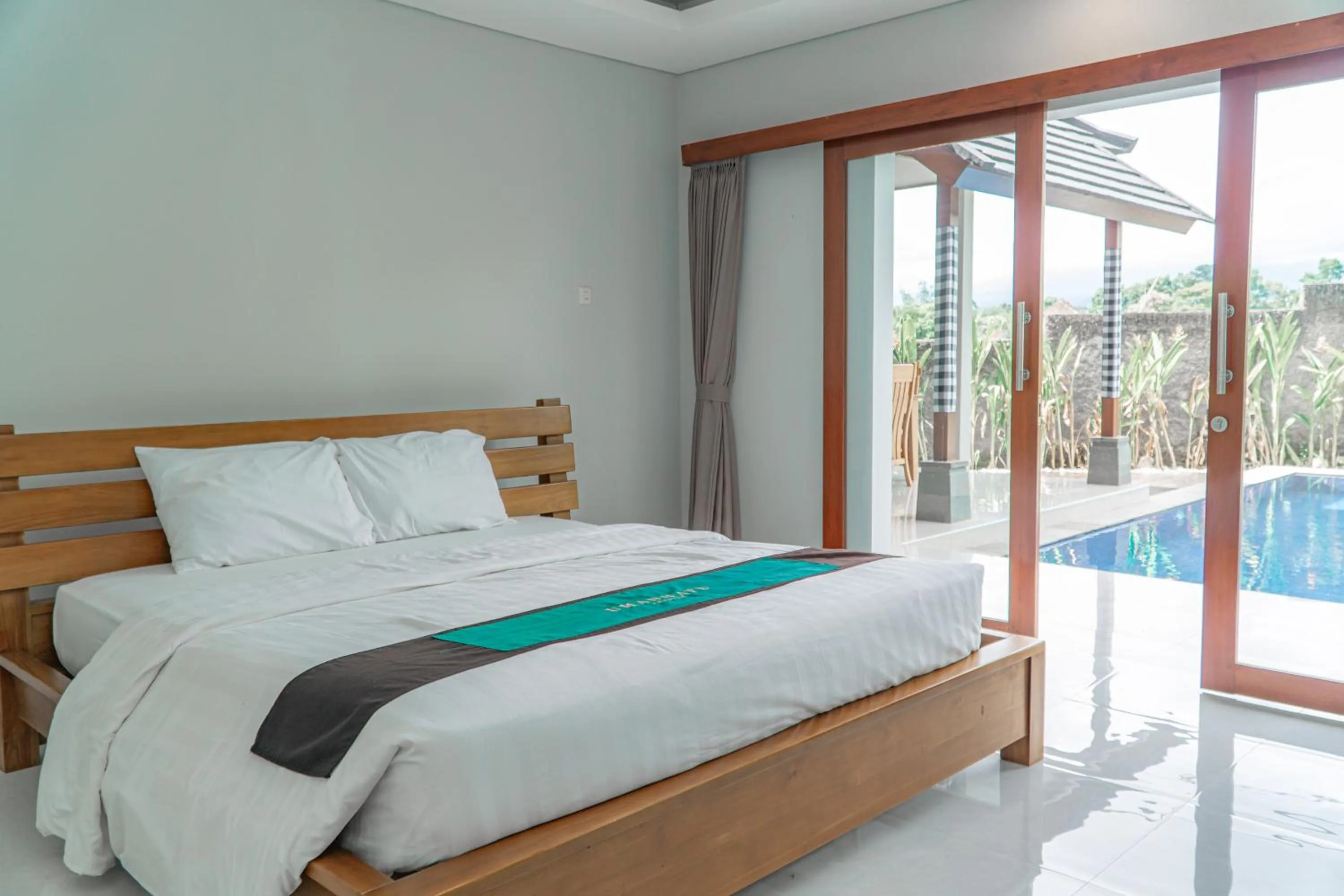 Photo of the whole room, Bed in Umadhatu Resort by Amerta