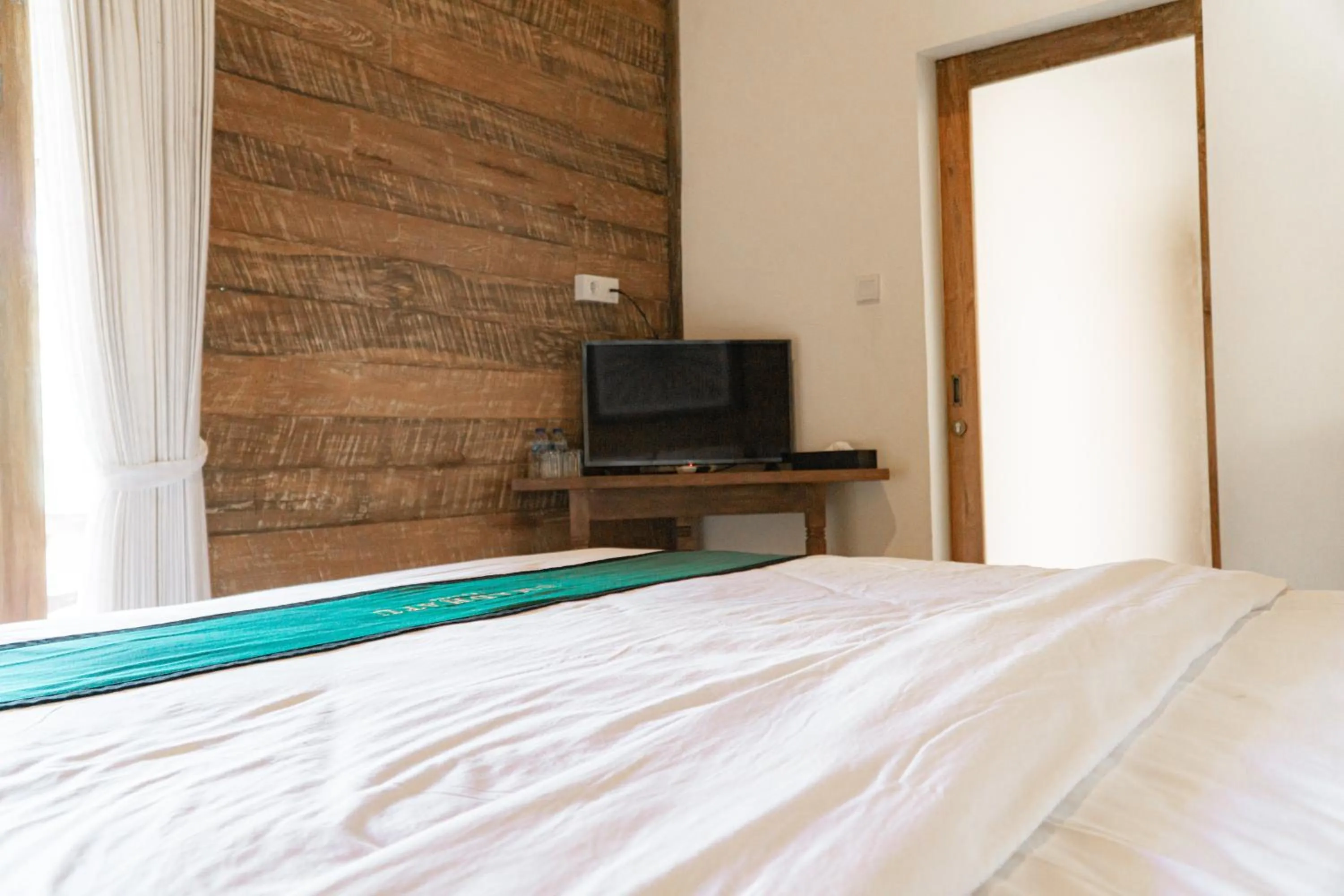 Bed in Umadhatu Resort by Amerta