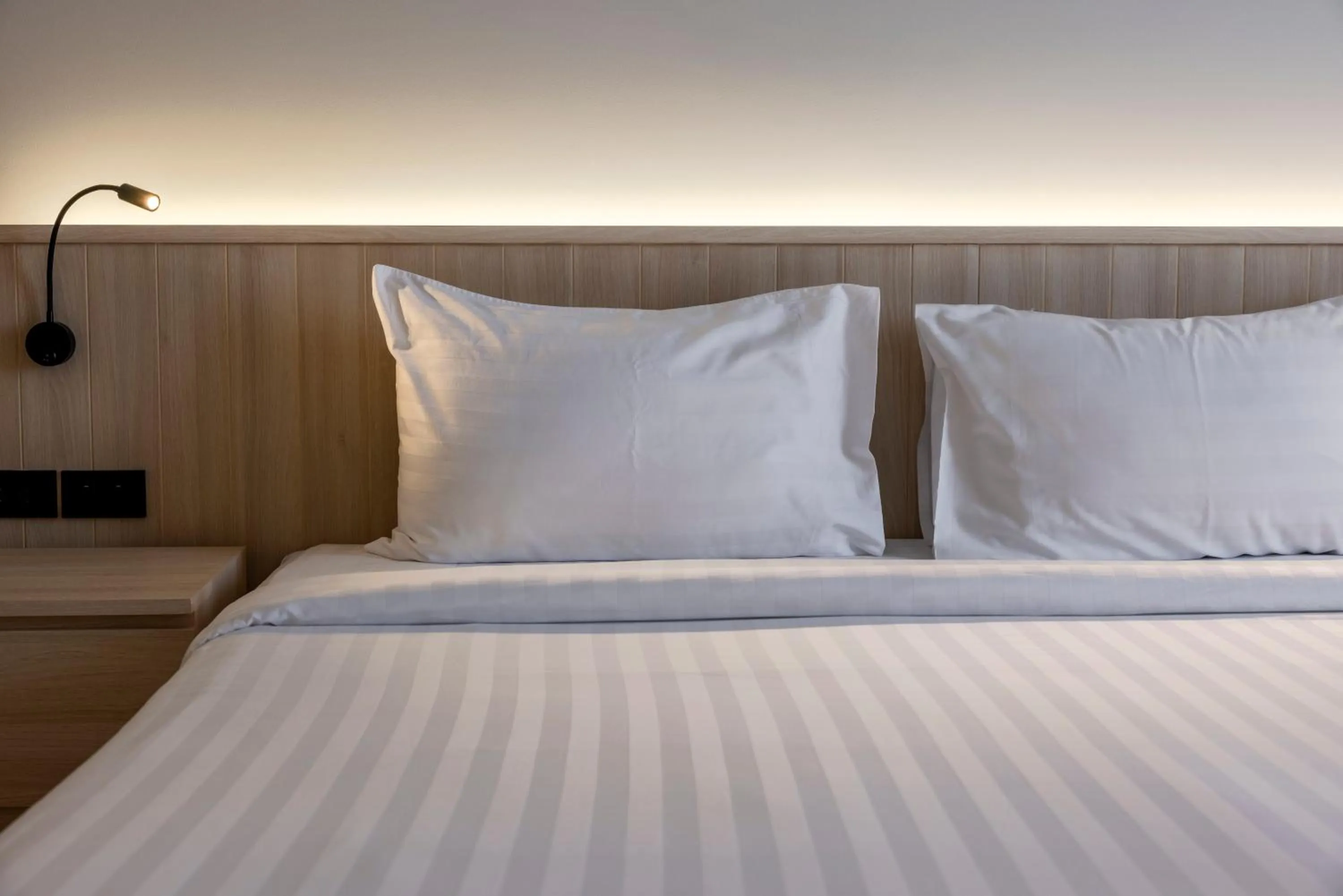 Bed in The Maruay Garden Hotel