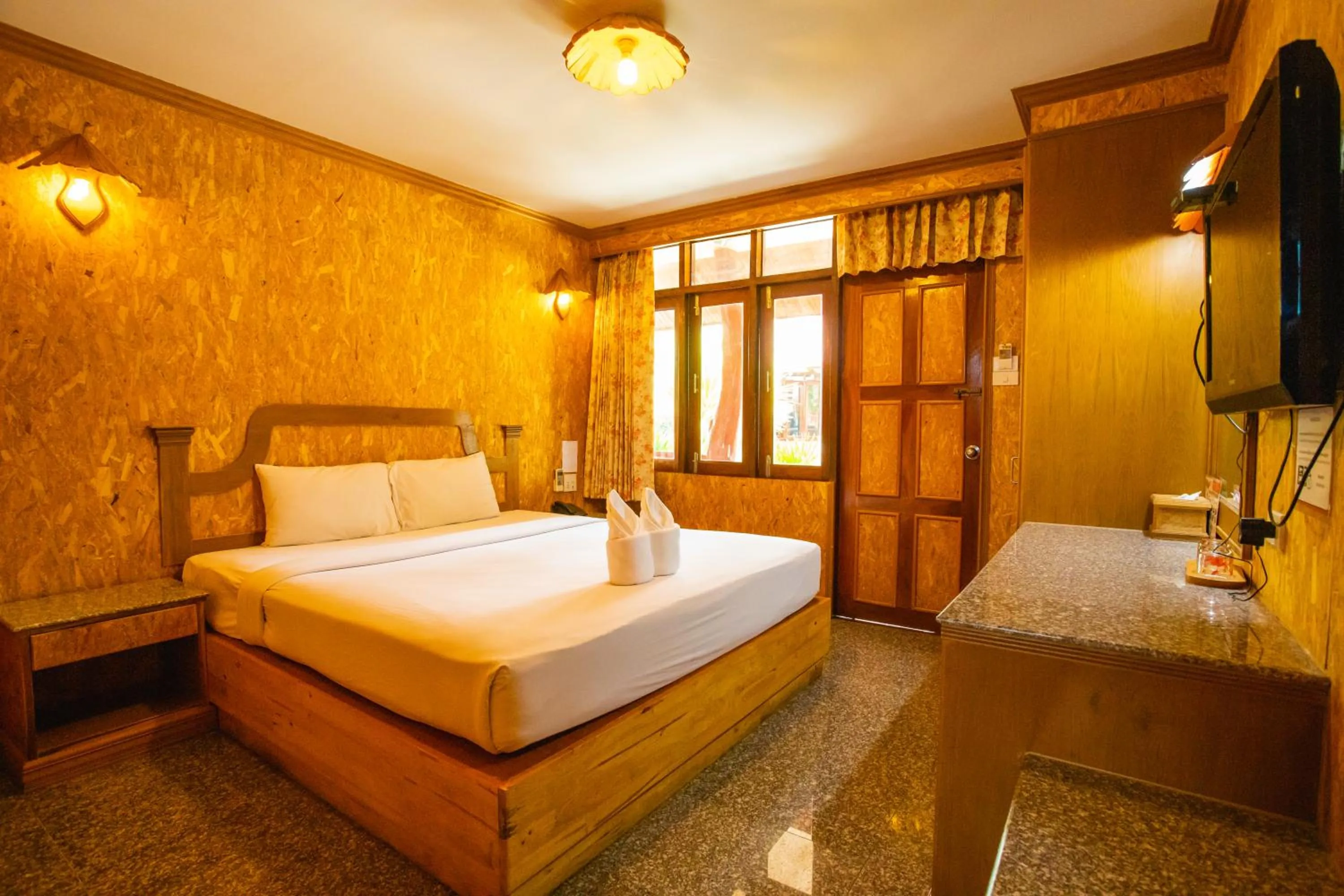 Bed in Chatsuree Boutique Resort