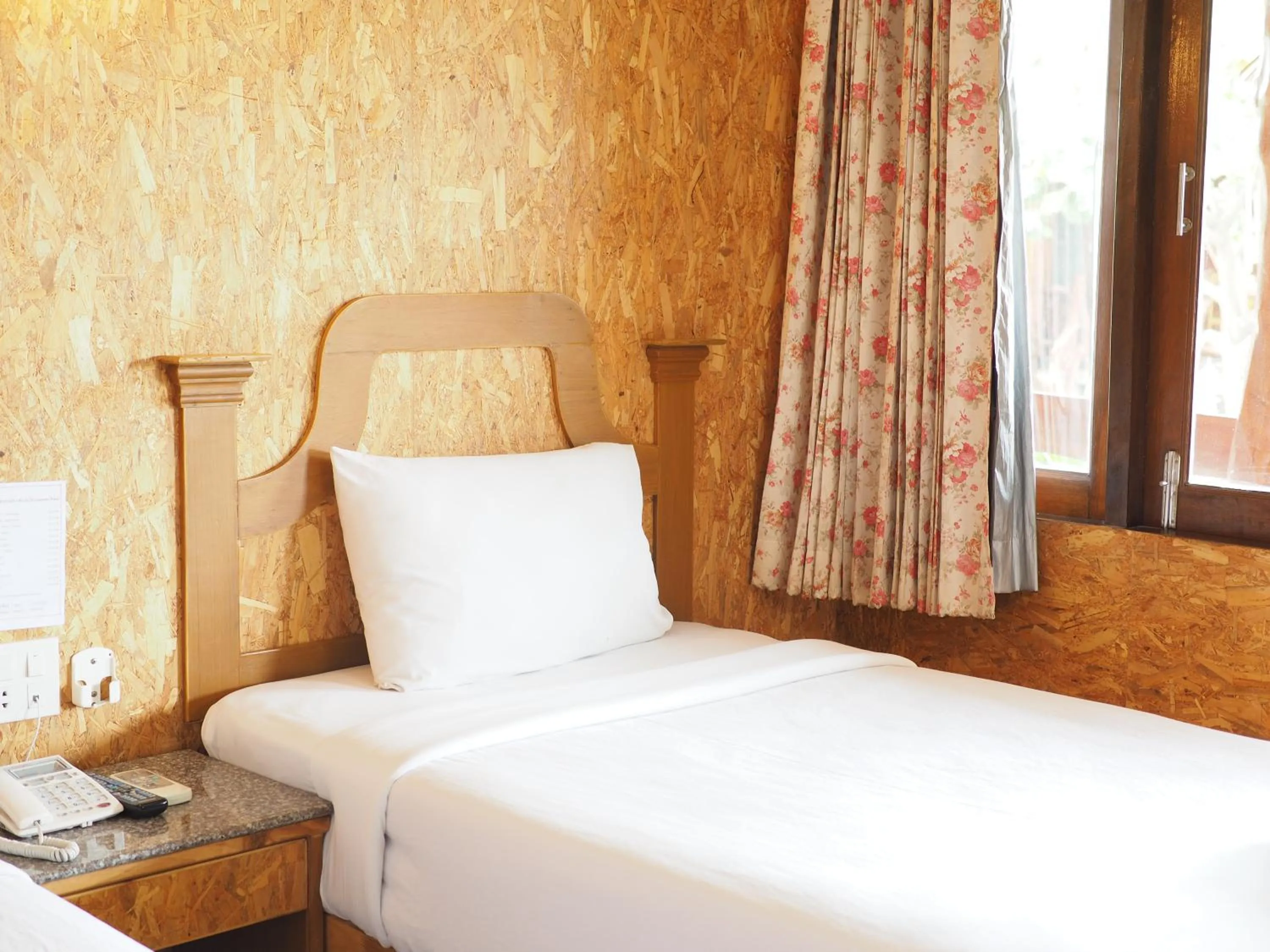 Bed in Chatsuree Boutique Resort