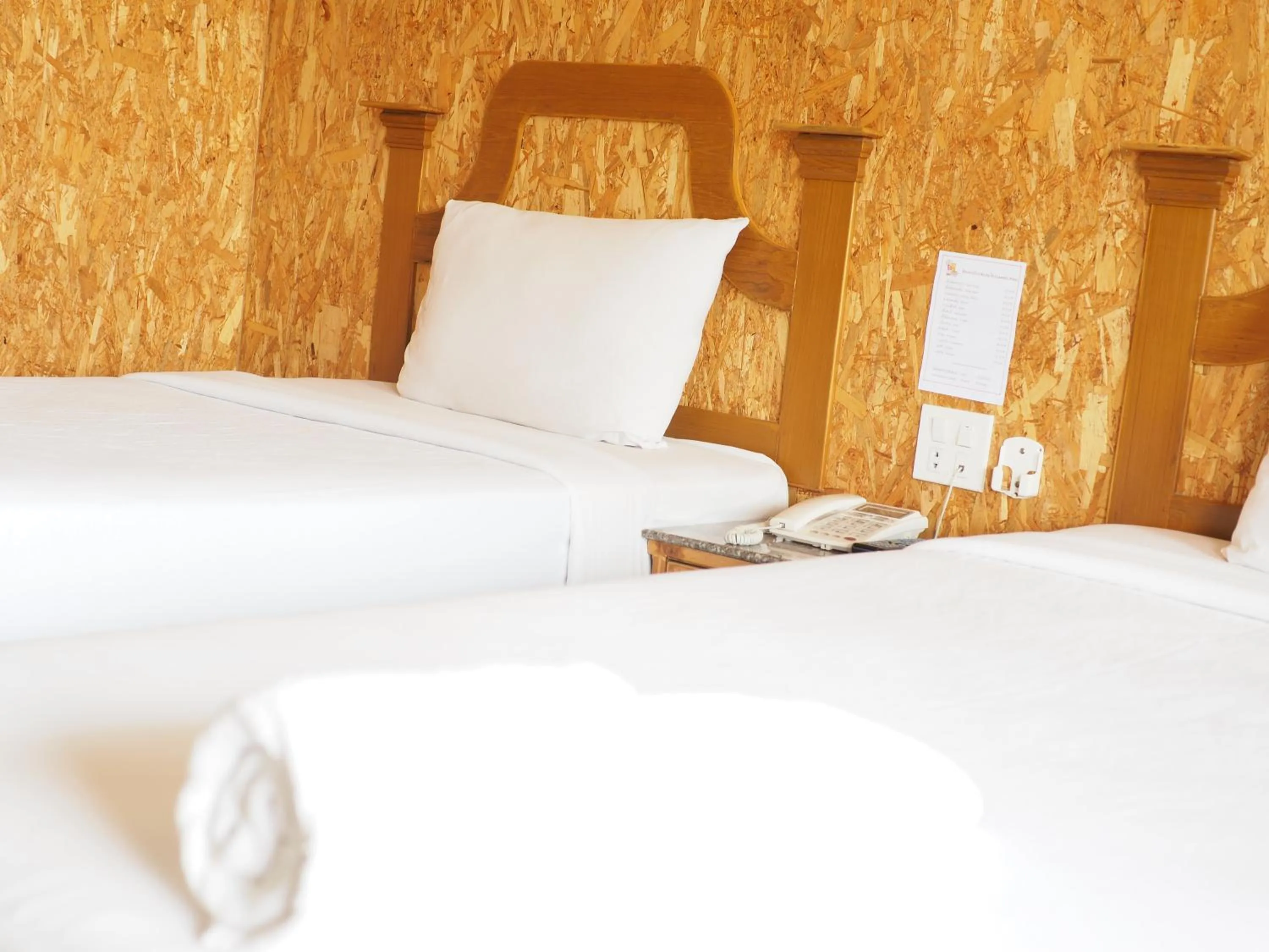 Bed in Chatsuree Boutique Resort