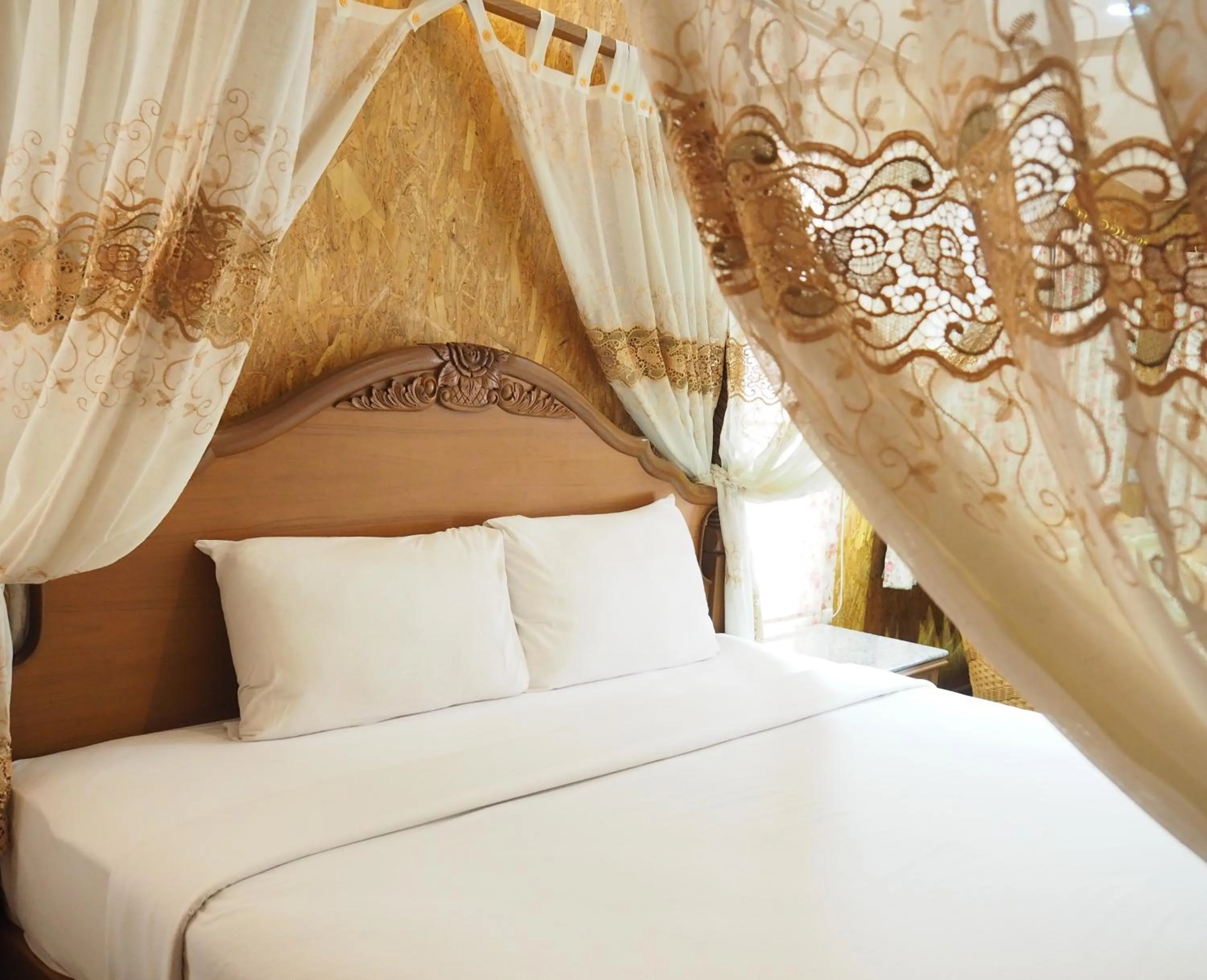 Bed in Chatsuree Boutique Resort