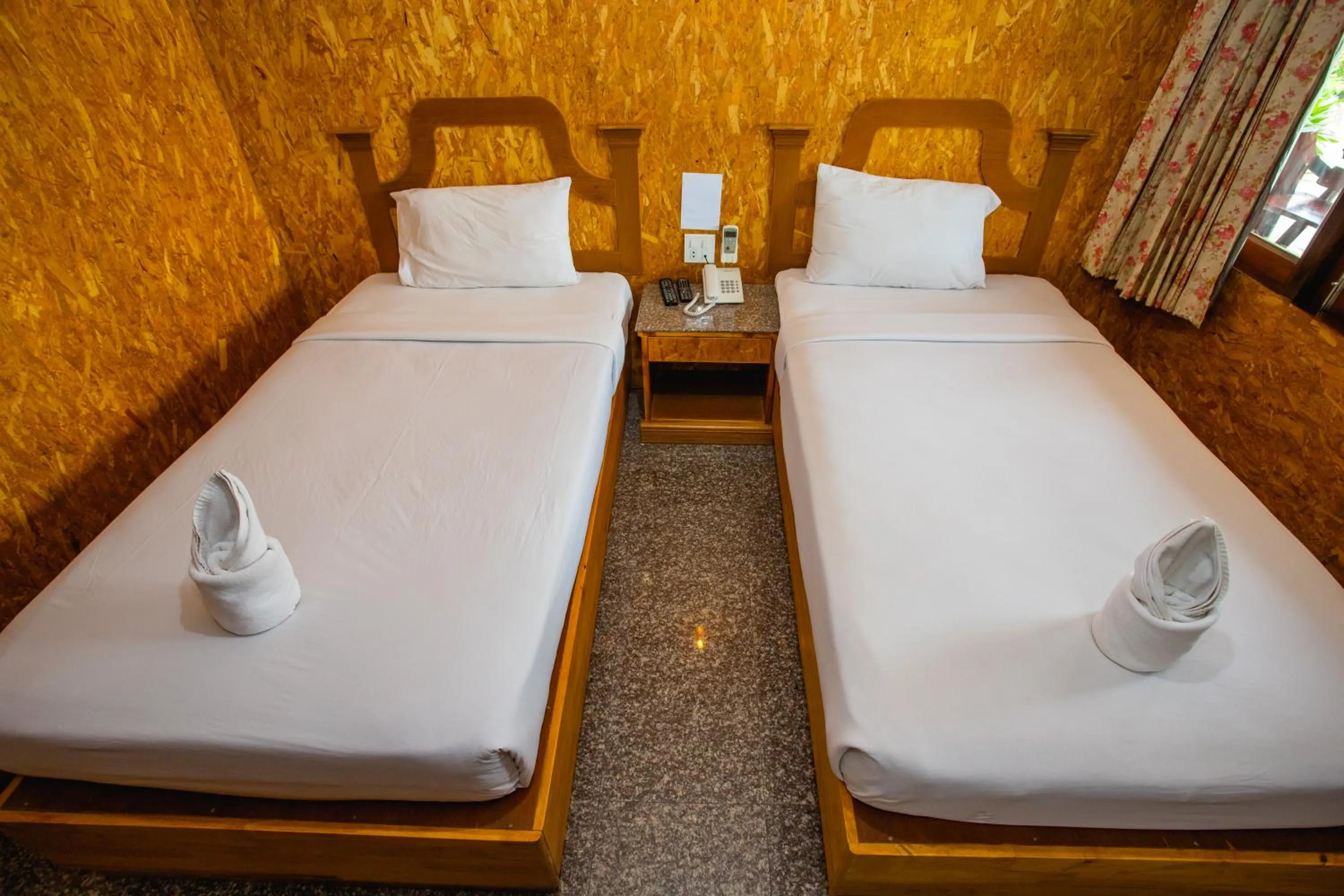 Bed in Chatsuree Boutique Resort