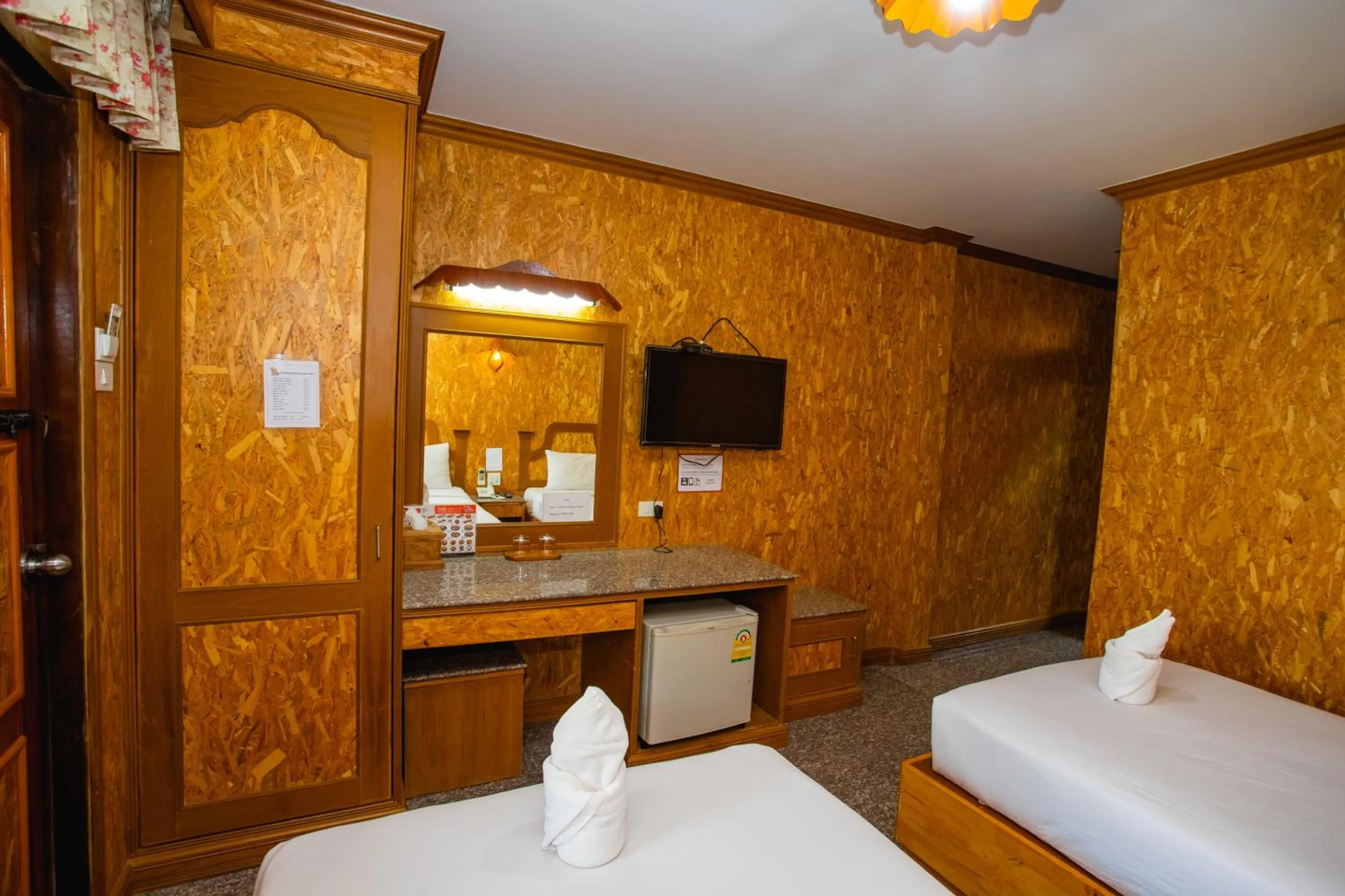 Bed in Chatsuree Boutique Resort