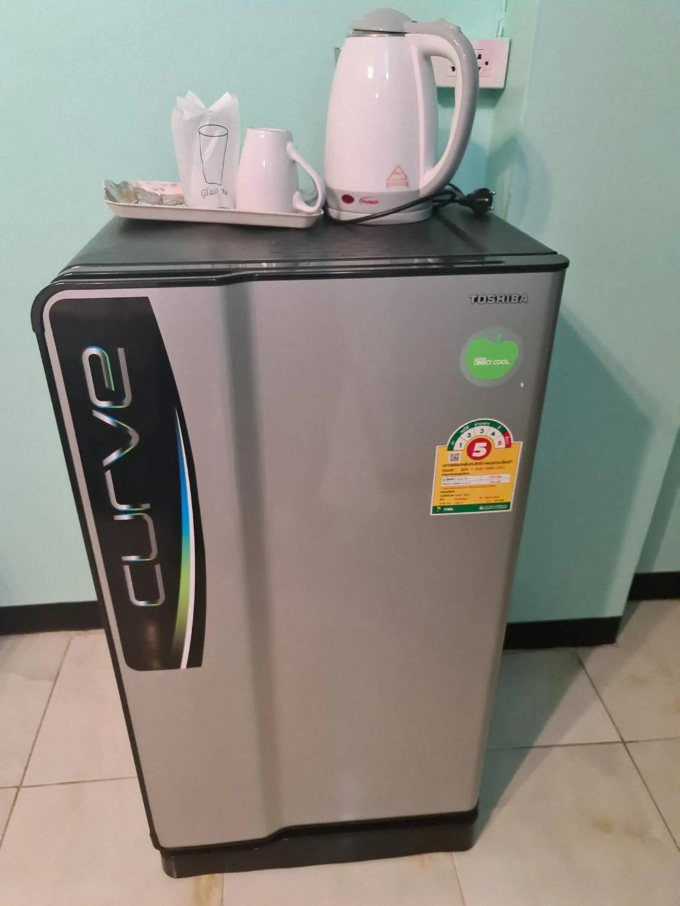 Kitchen or kitchenette in Royal Land Mae Klong Hotel