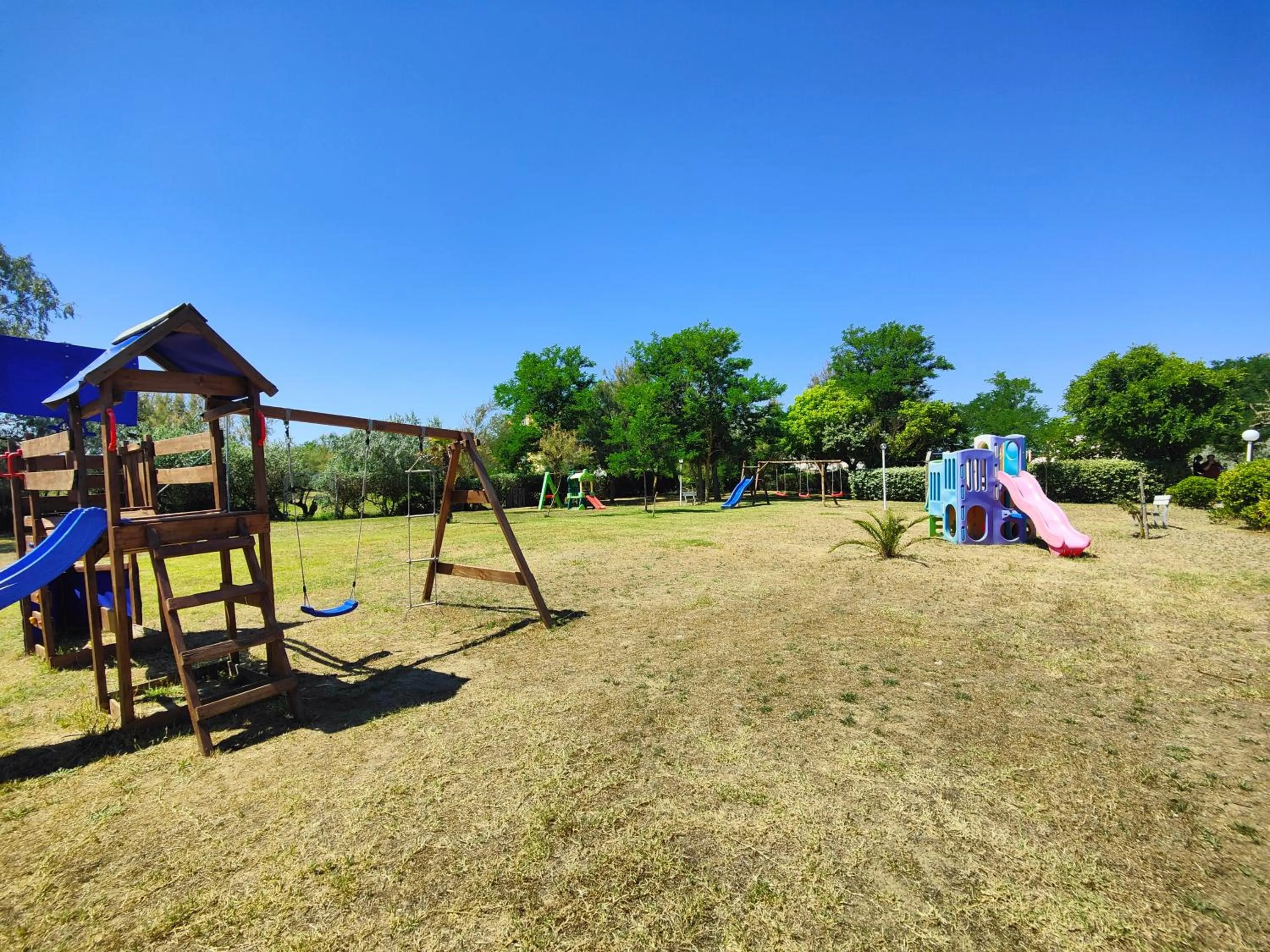 Children play ground in Long Beach Village Residence on the sea with private beach included
