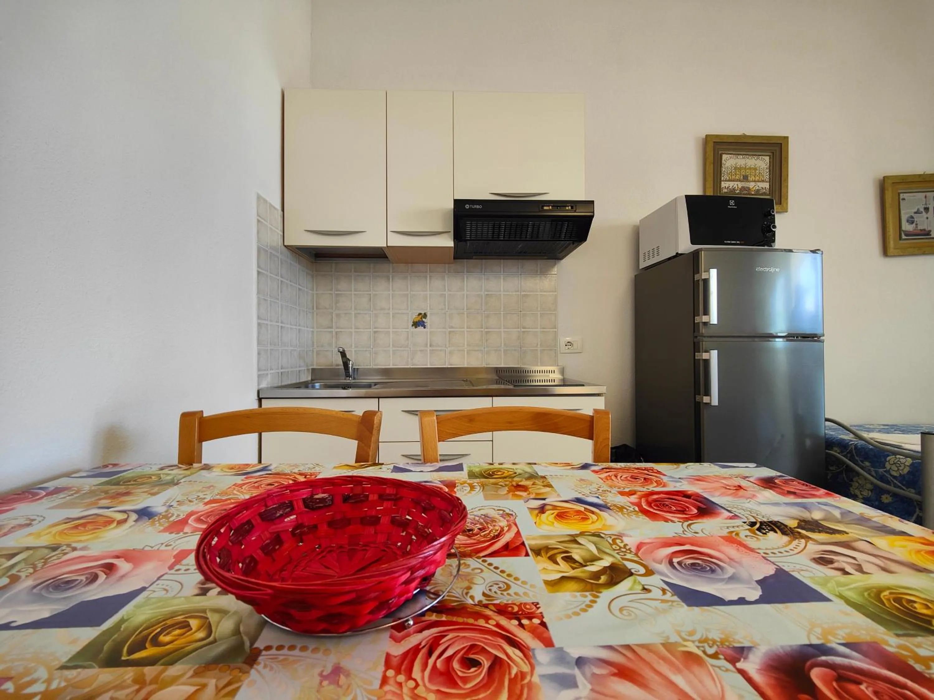 Kitchen or kitchenette in Long Beach Village Residence on the sea with private beach included