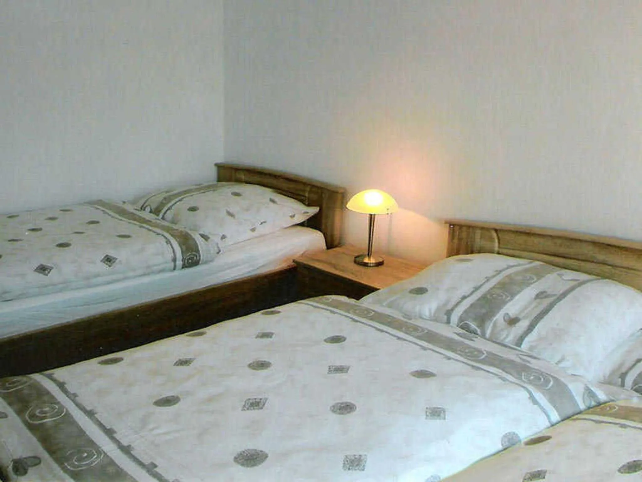 Bed in Ferienwohnungen Am Schwanenteich