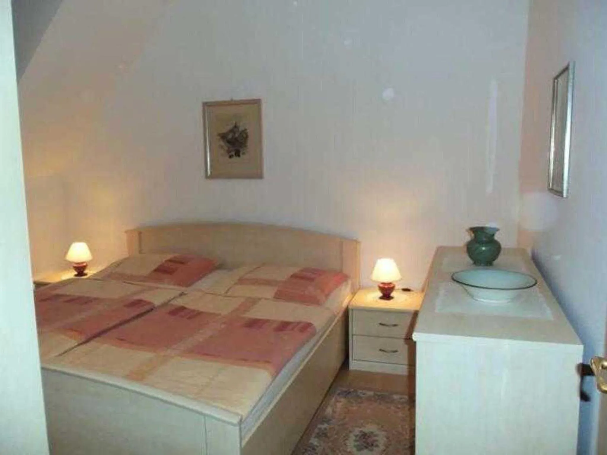 Bed in Ferienwohnungen Am Schwanenteich