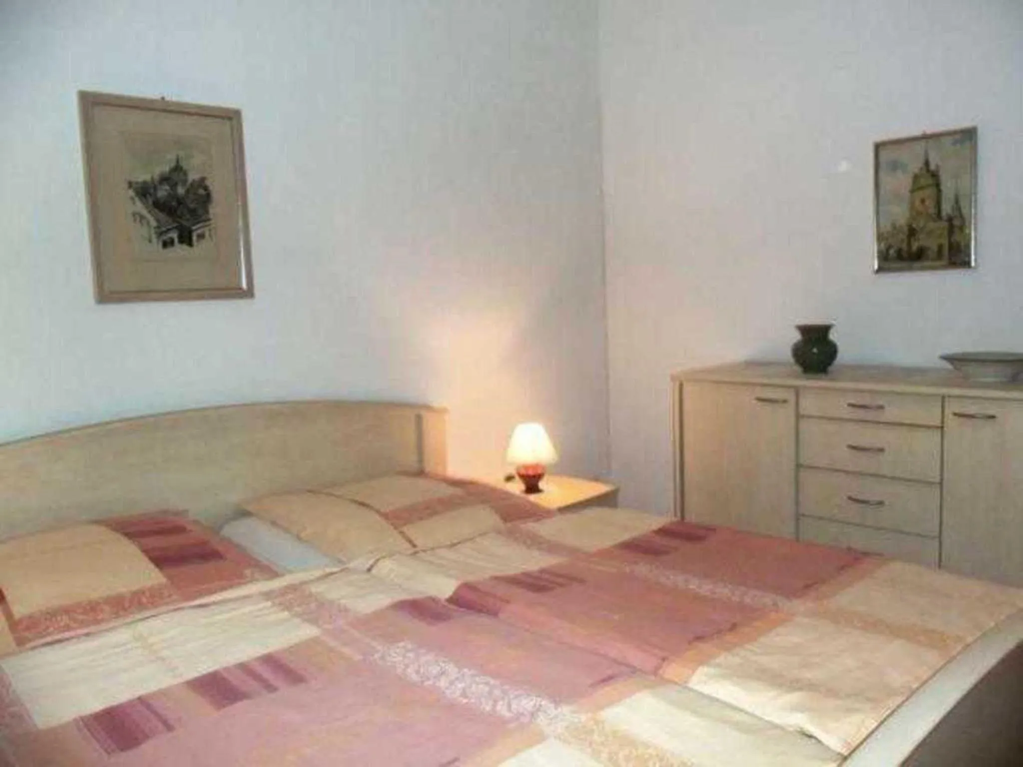 Bed in Ferienwohnungen Am Schwanenteich