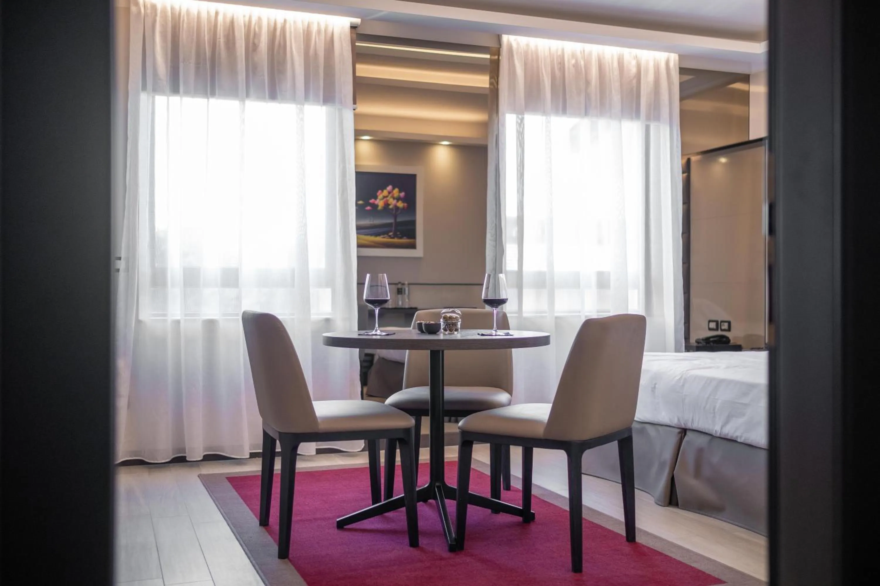 Living room, Bed in Hotel Guerro