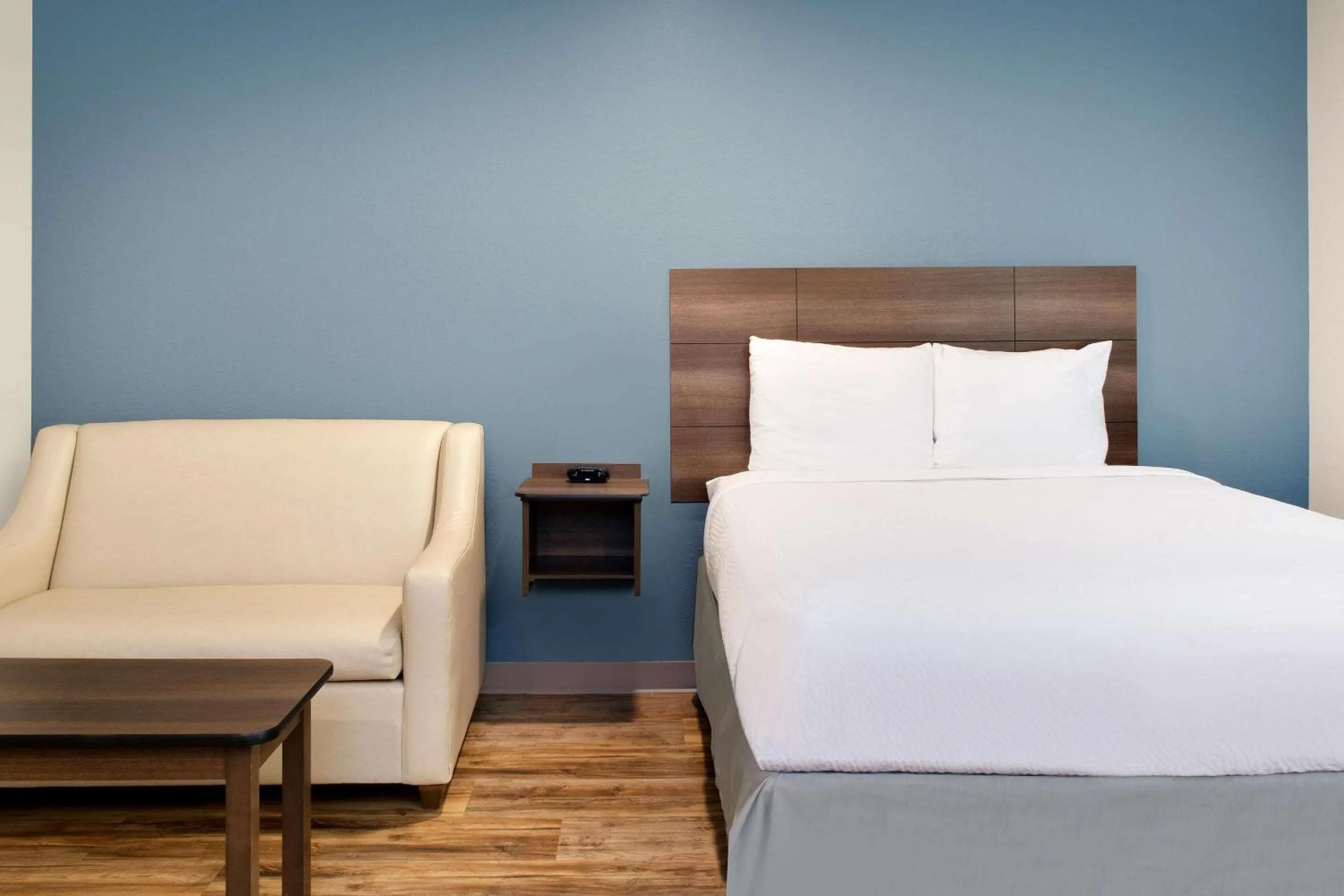 Photo of the whole room, Bed in WoodSpring Suites Nashville Airport
