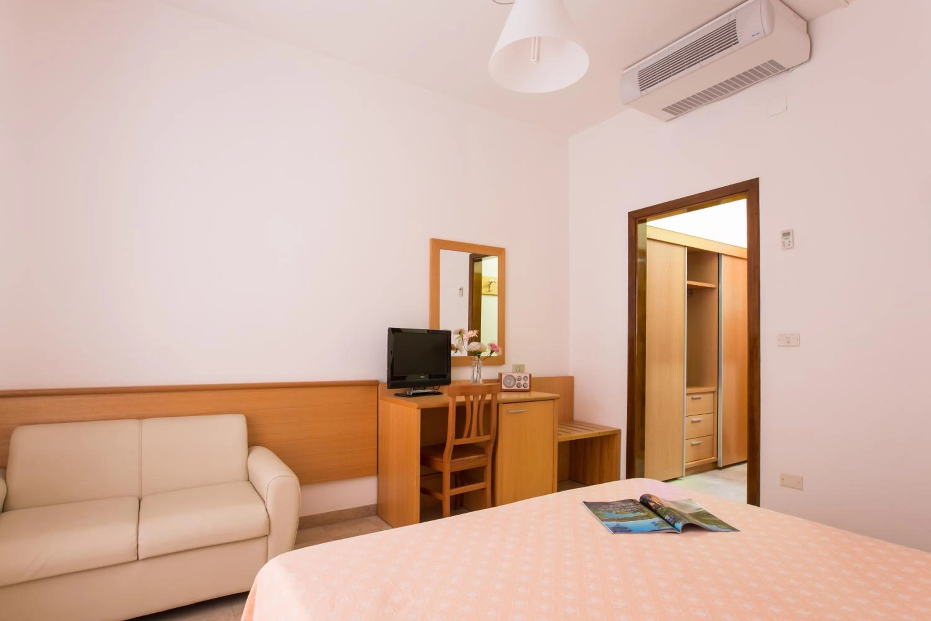 Bed in Hotel Mediterraneo